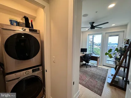 a view of living room washer and dryer