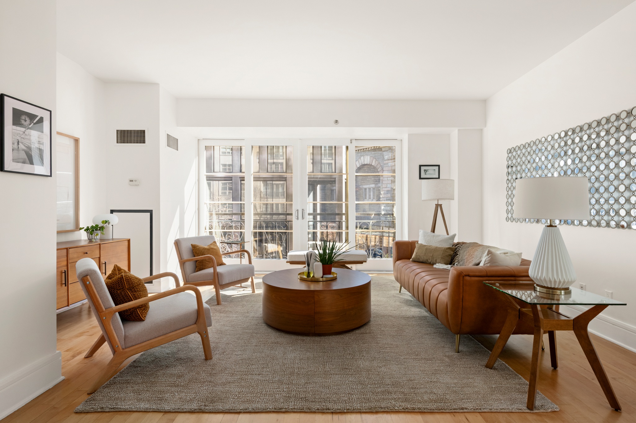 57 Front Street, Unit 303 Brooklyn, NY 11201 - Photo 2 of 15 a living room with furniture and a potted plant