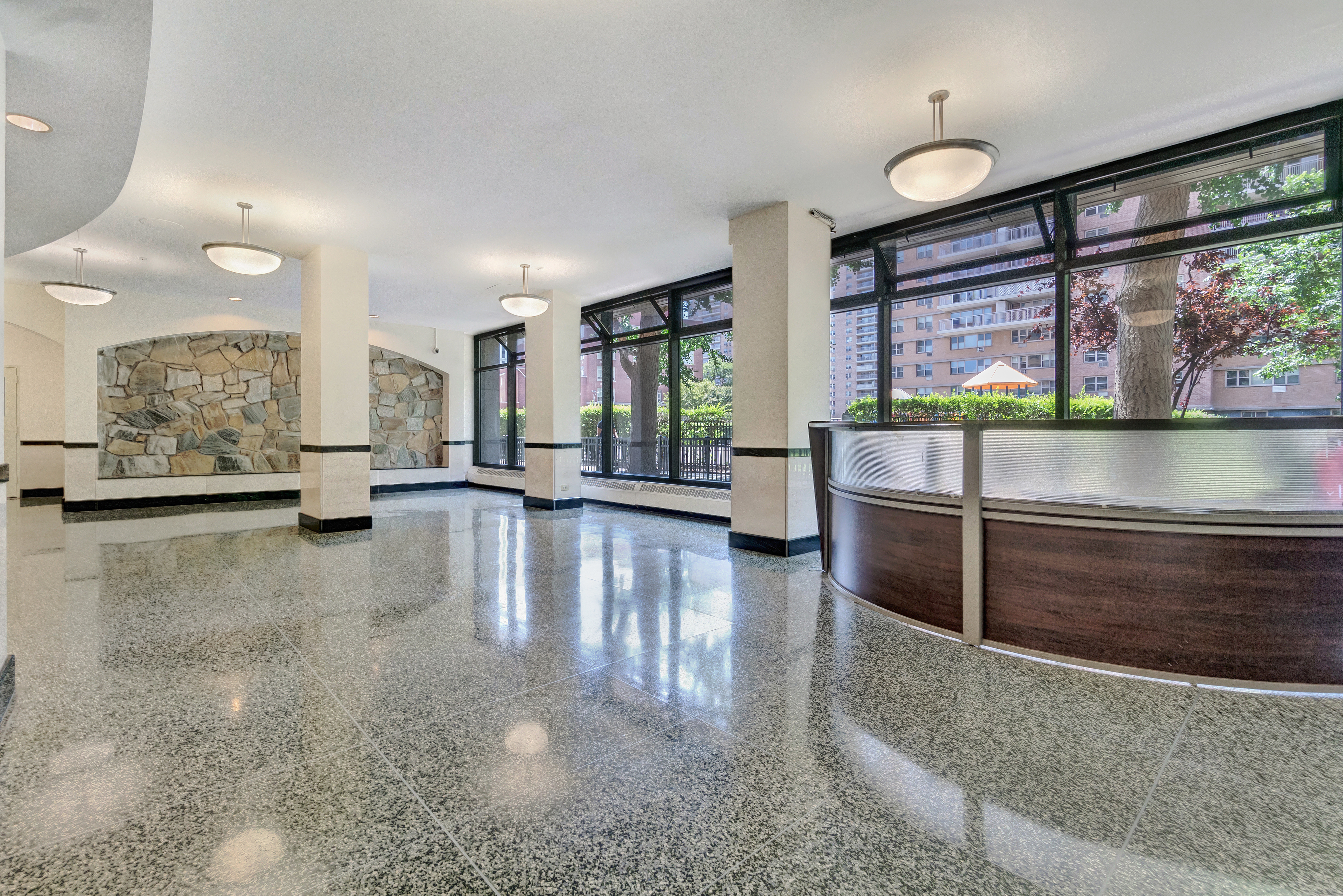 448 Neptune Avenue, Unit 14J Brooklyn, NY 11224 - Photo 17 of 21 a lobby with furniture and window