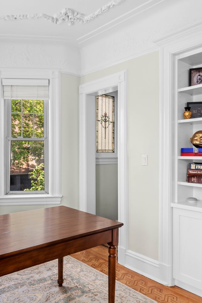 685 East 22nd Street Brooklyn, NY 11210 - Photo 21 of 43 a view of a room with a window and wooden floor