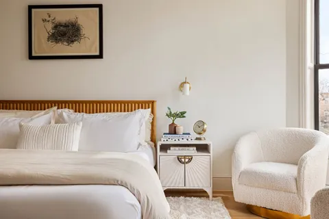 a bathroom with a sink a mirror and shower