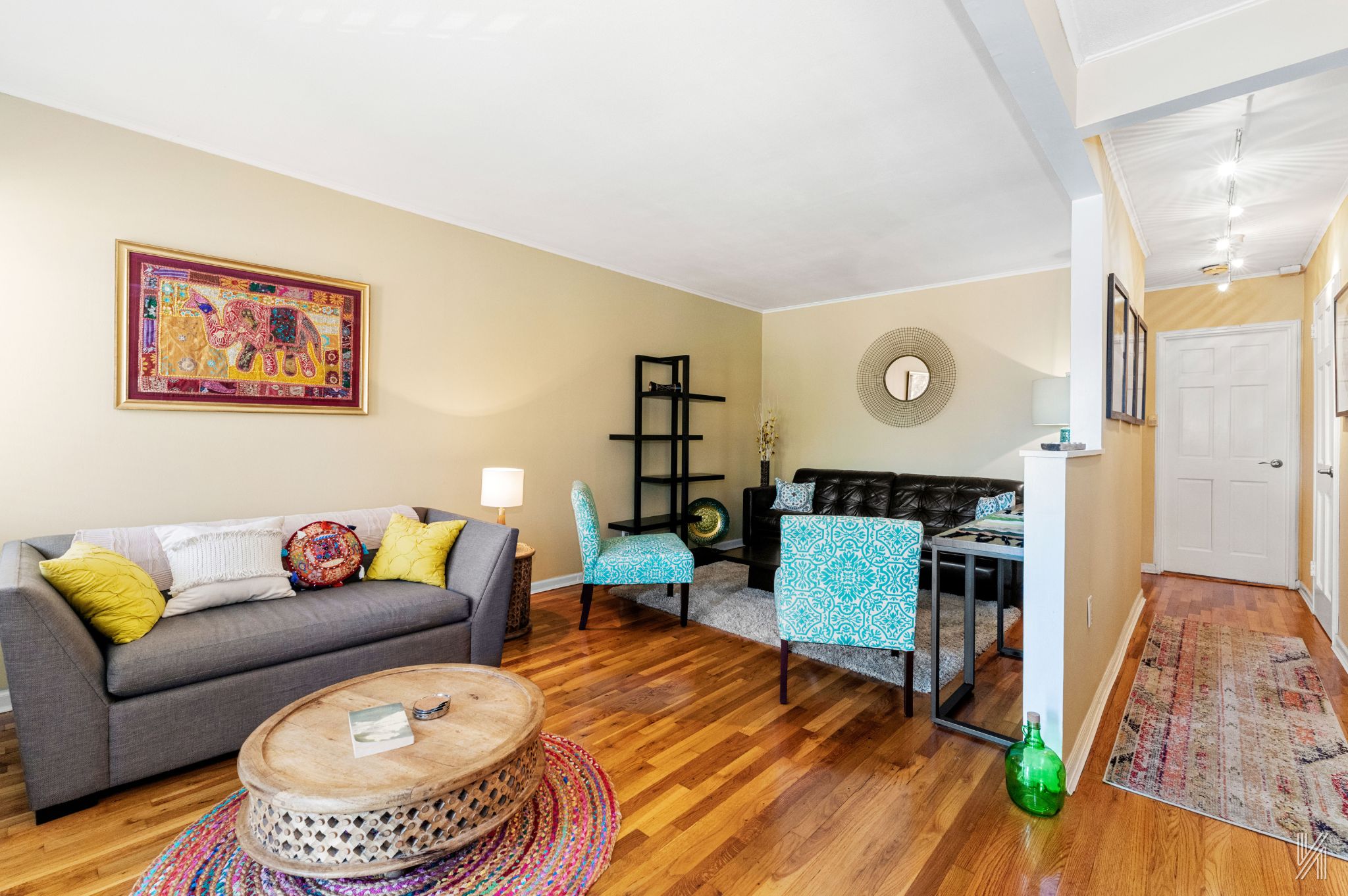 67-17 Eliot Avenue Queens, NY 11379 - Photo 4 of 21 a living room with furniture and a wooden floor