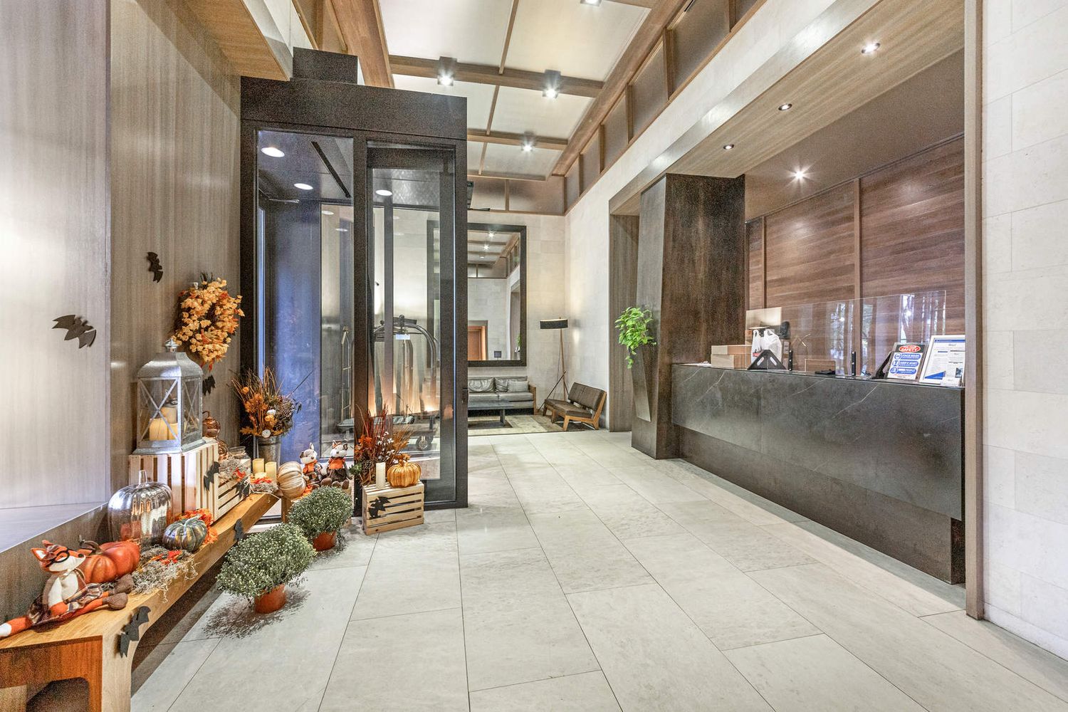 225 Rector Place, Unit 7M Manhattan, NY 10280 - Photo 11 of 13 a lobby with furniture and a glass door shower