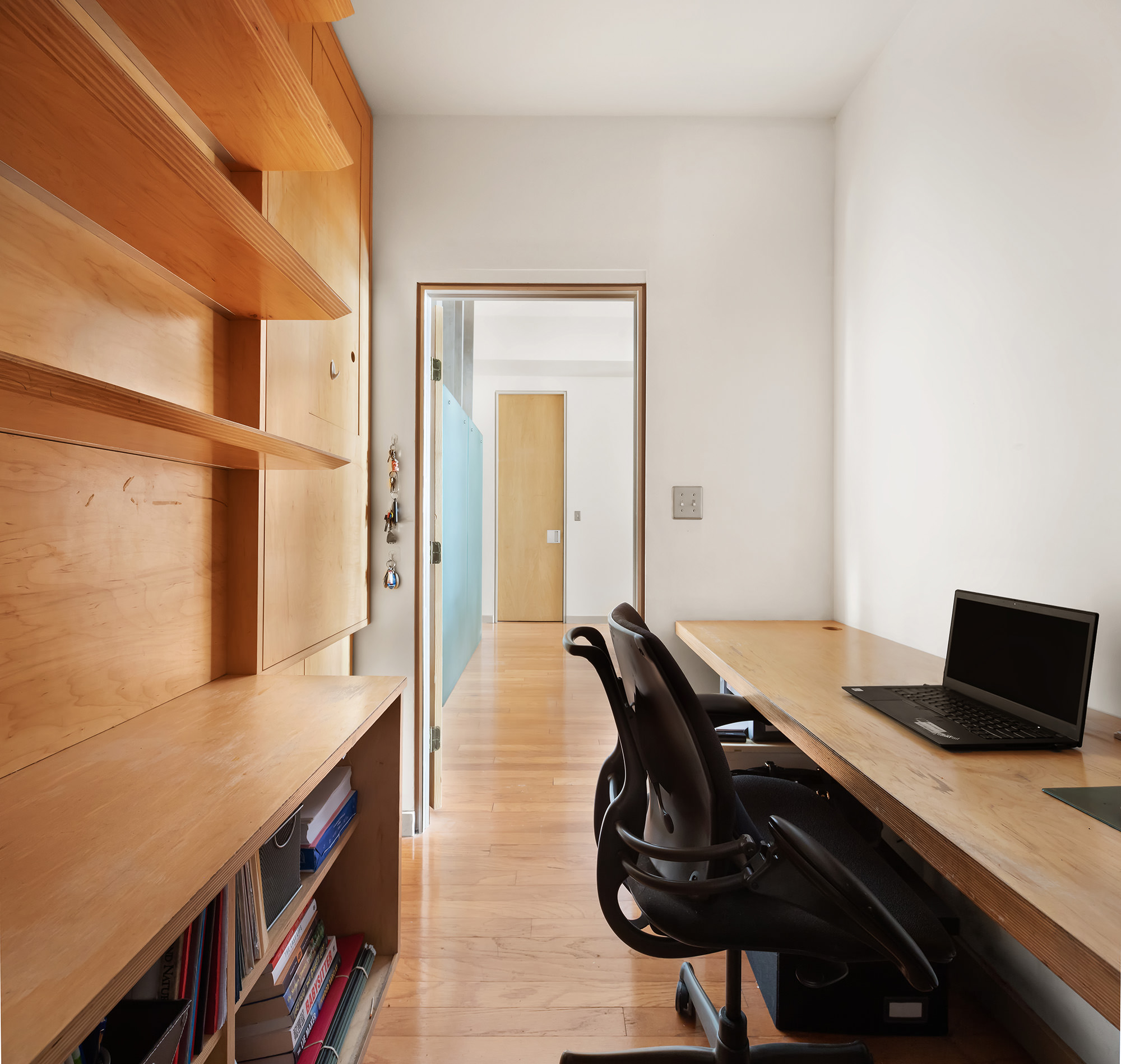 3 Hanover Square, Unit 14EF Manhattan, NY 10004 - Photo 5 of 14 a view of a workspace with furniture
