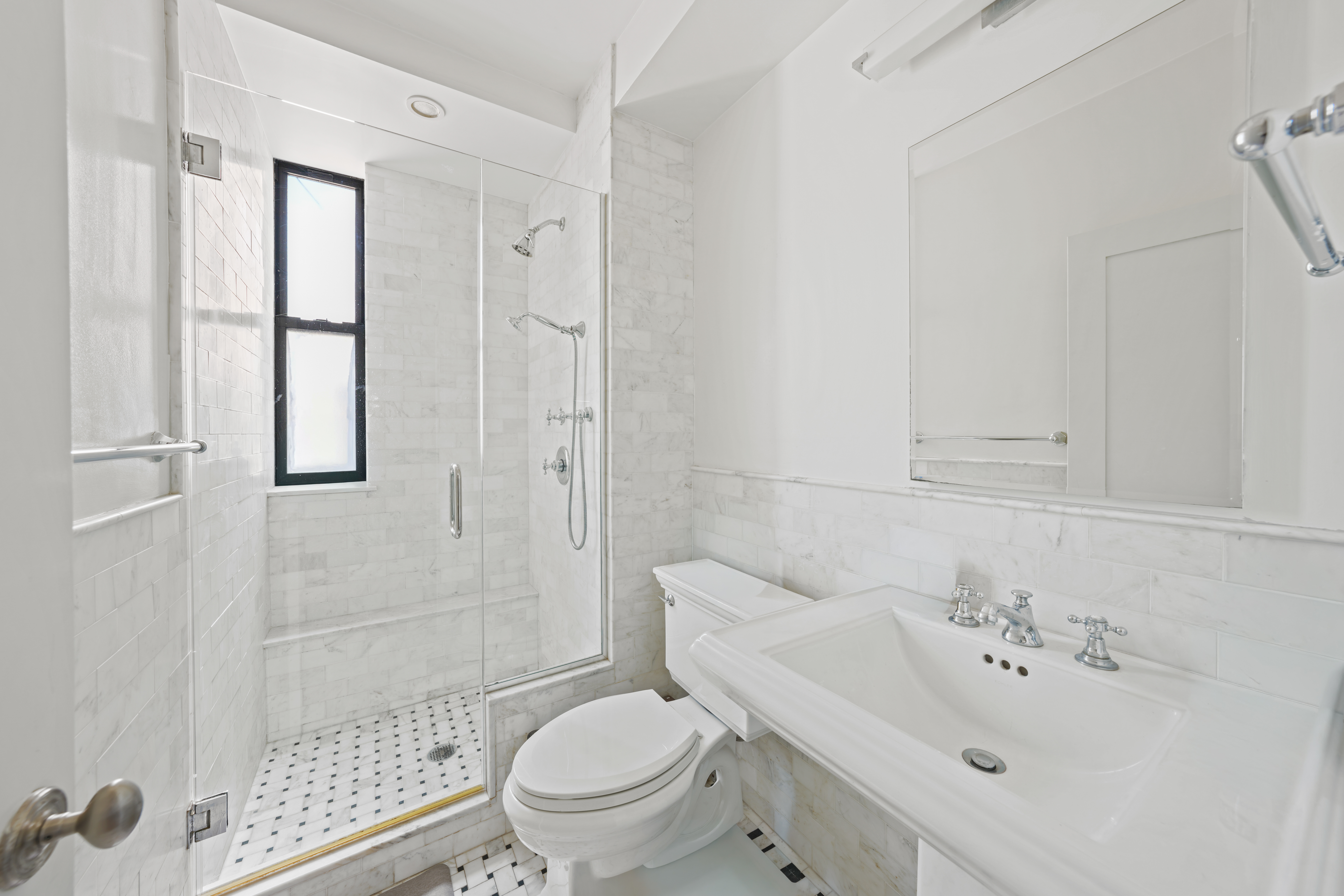 177 East 77th Street, Unit PHC Manhattan, NY 10075 - Photo 19 of 26 a bathroom with a sink toilet and shower