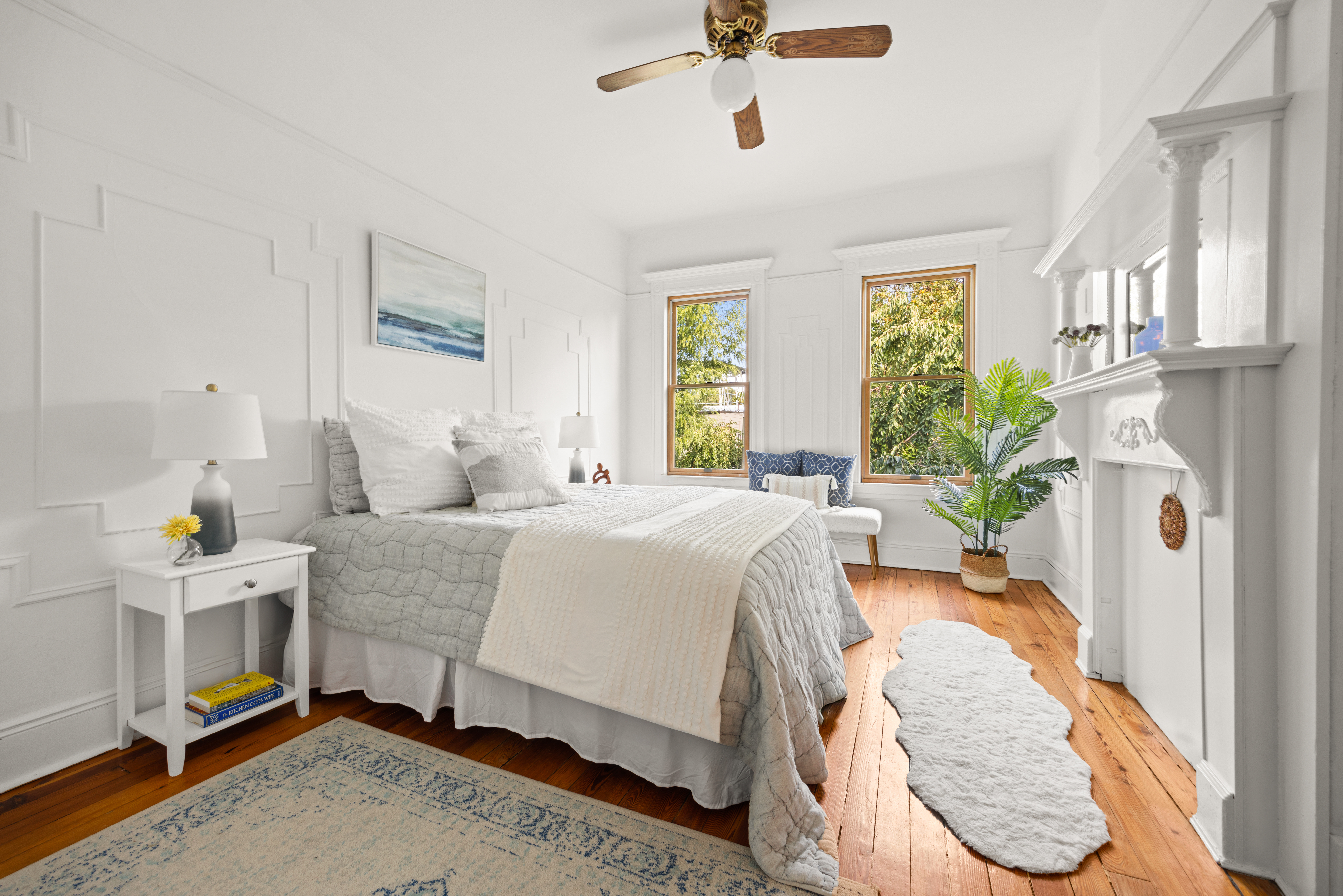 99 East 2nd Street Brooklyn, NY 11218 - Photo 11 of 24 a bed room with a bed and a chair