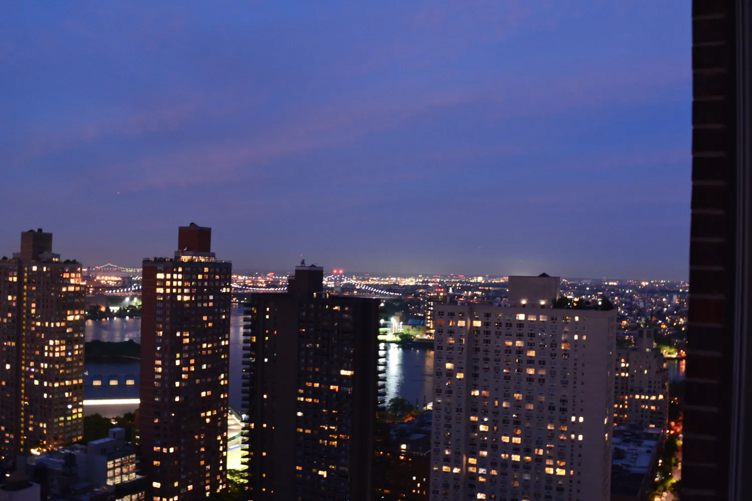 a room with furniture and a chandelier
