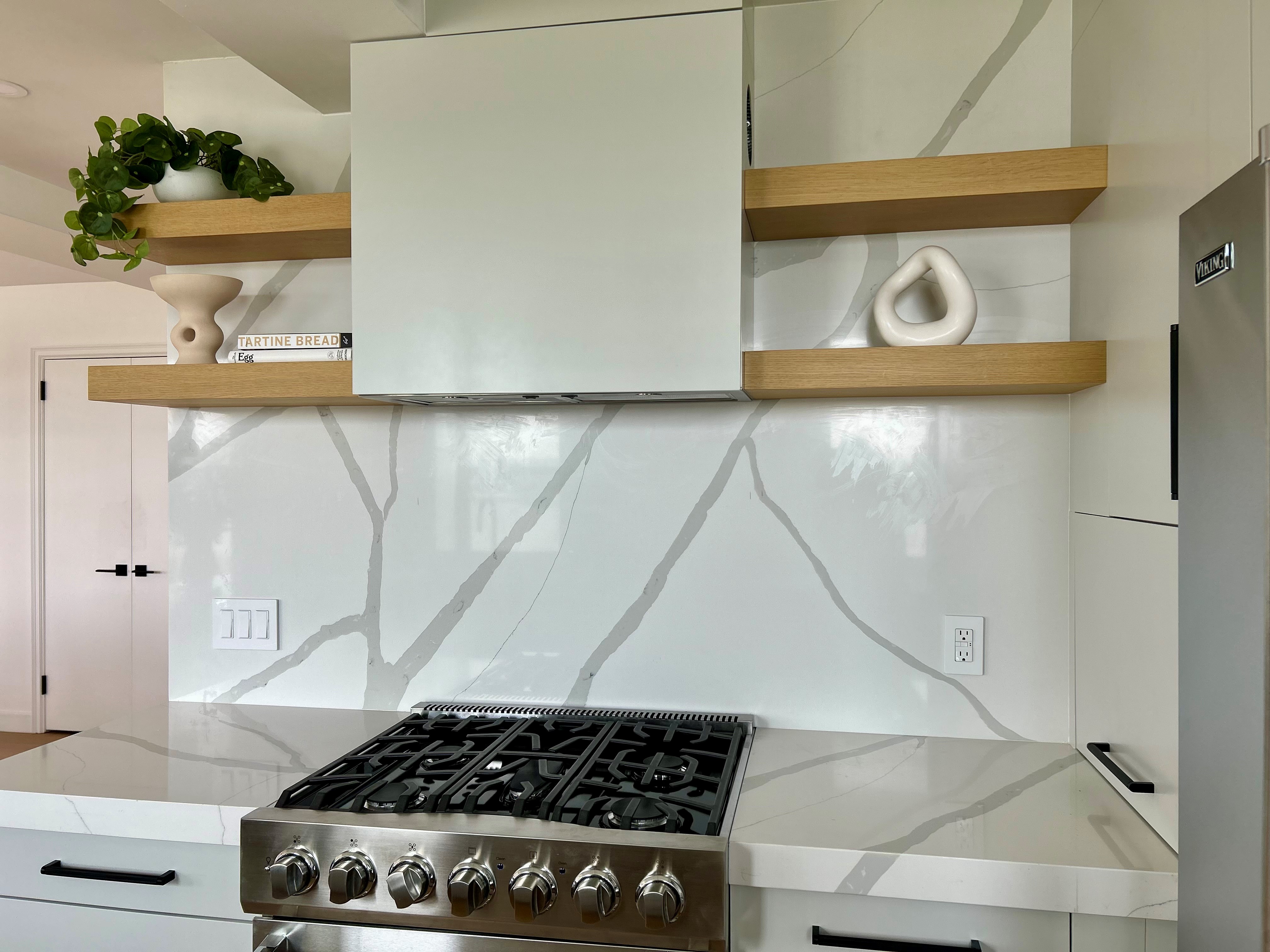 230 Riverside Drive, Unit 14AC Manhattan, NY 10025 - Photo 10 of 30 a kitchen with a stove and a microwave