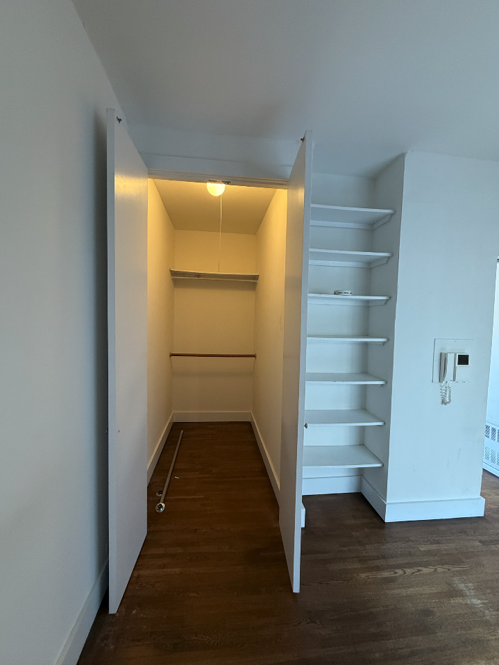 455 Park Avenue South, Unit PH1 Manhattan, NY 10016 - Photo 10 of 17 a view of walk in closet with empty racks