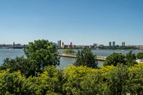 a view of a lake with a city