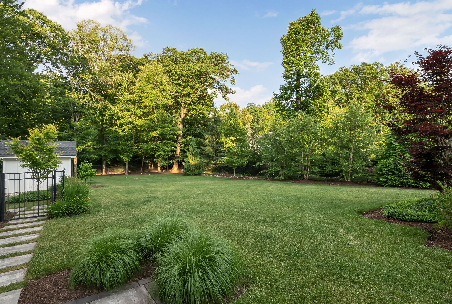 838 Seneca Road Franklin Lakes, NJ 07417 - Photo 79 of 92 a view of a grassy field with trees
