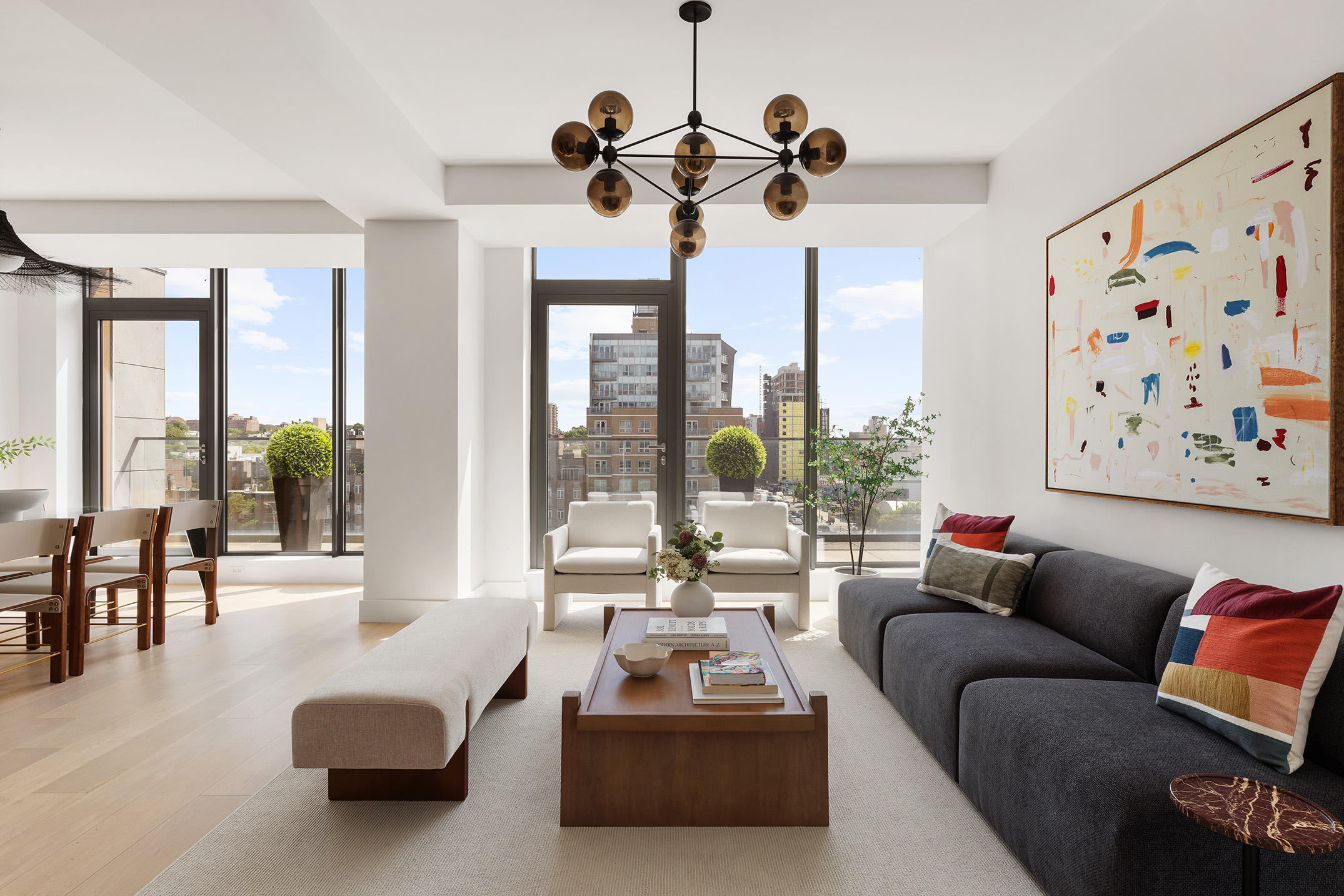 251 1st Street, Unit 7F Brooklyn, NY 11215 - Photo 3 of 24 a living room with furniture and a large window