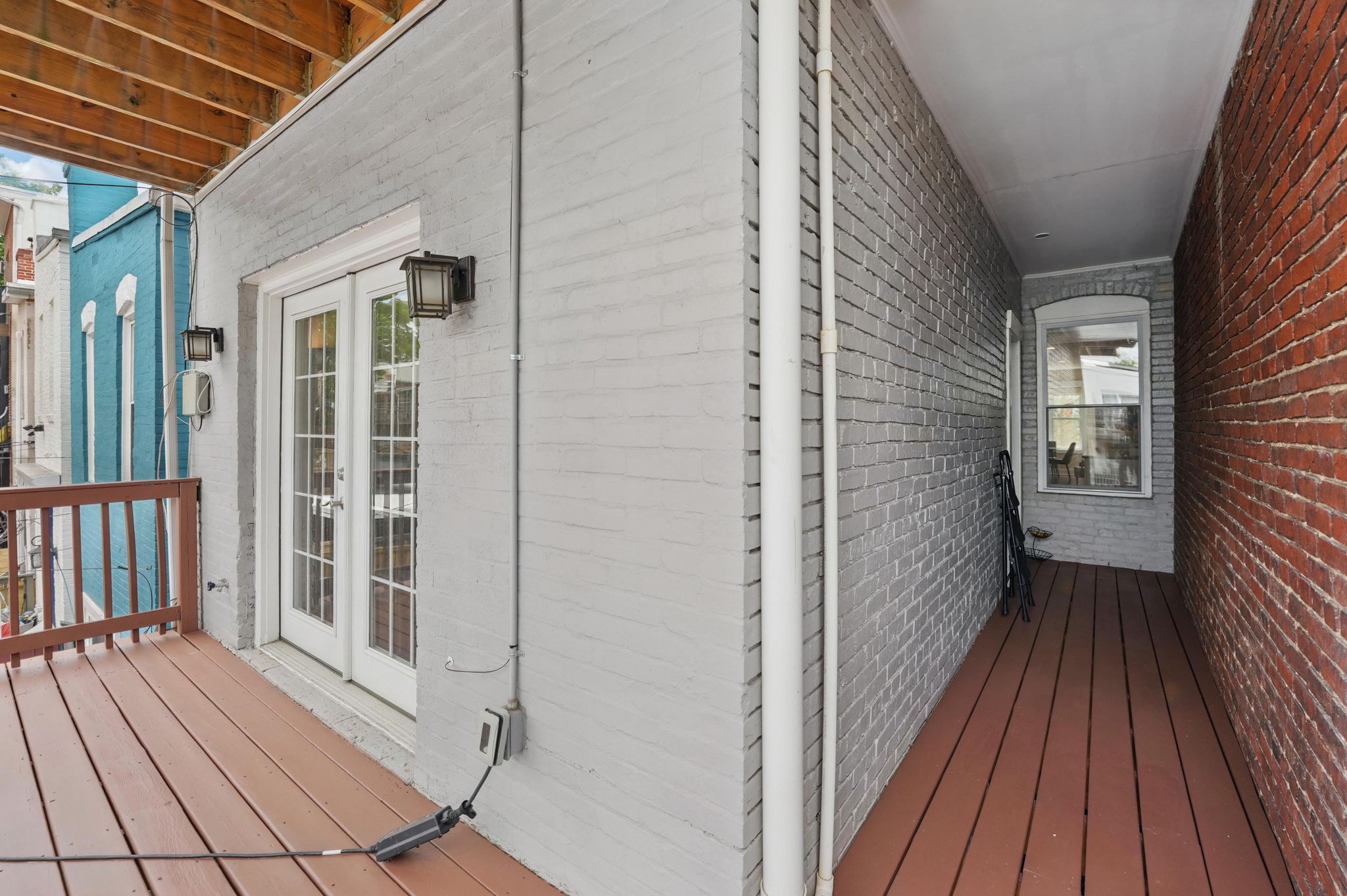 28 Q Street Northeast, Unit 2 Washington, DC 20002 - Photo 37 of 41 a view of a balcony with wooden floor