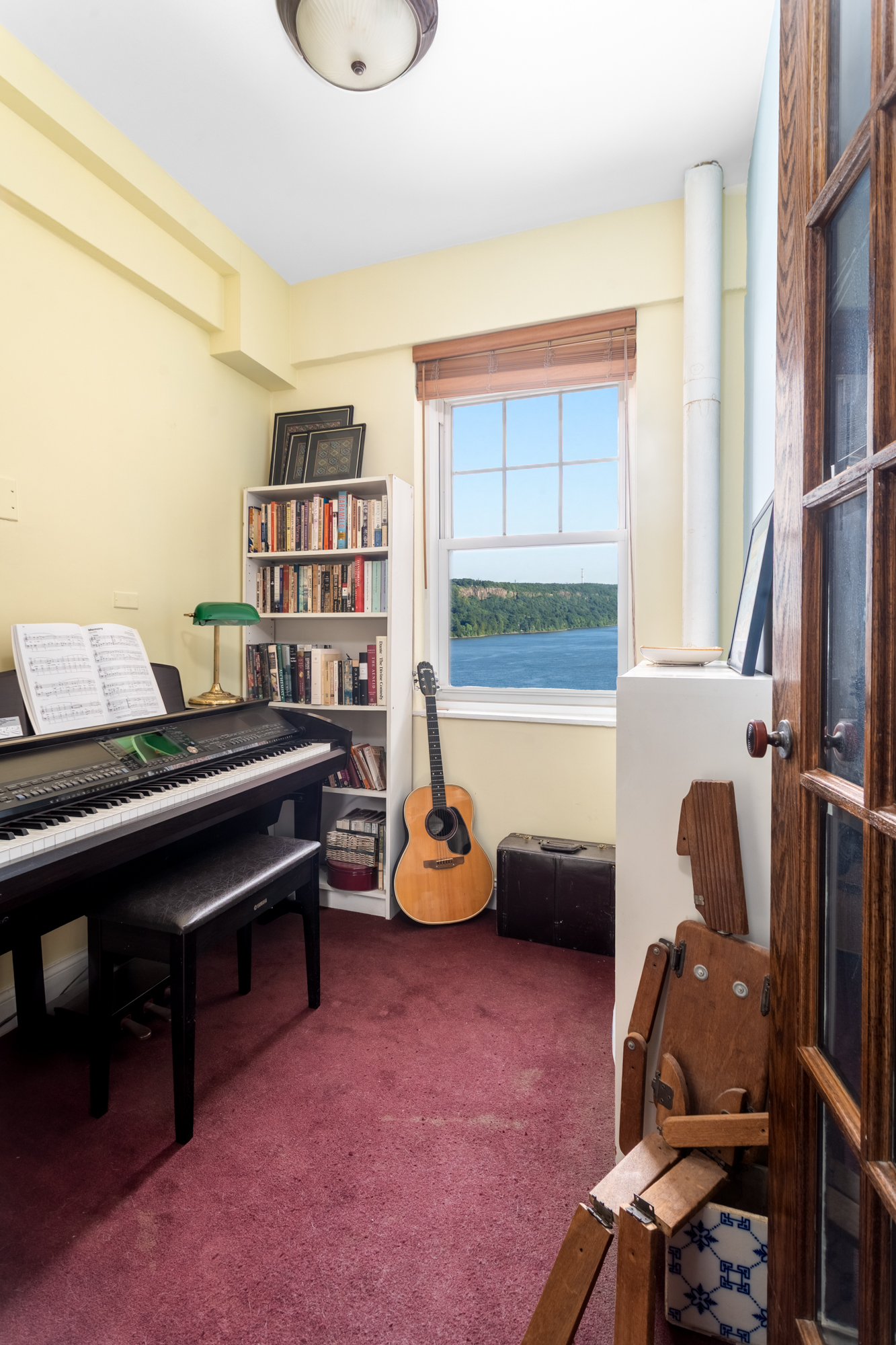 180 Cabrini Boulevard, Unit 61 Manhattan, NY 10033 - Photo 15 of 33 a room with furniture and a window