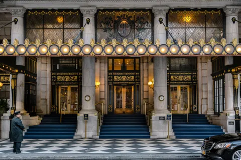 a view of a hall with many windows