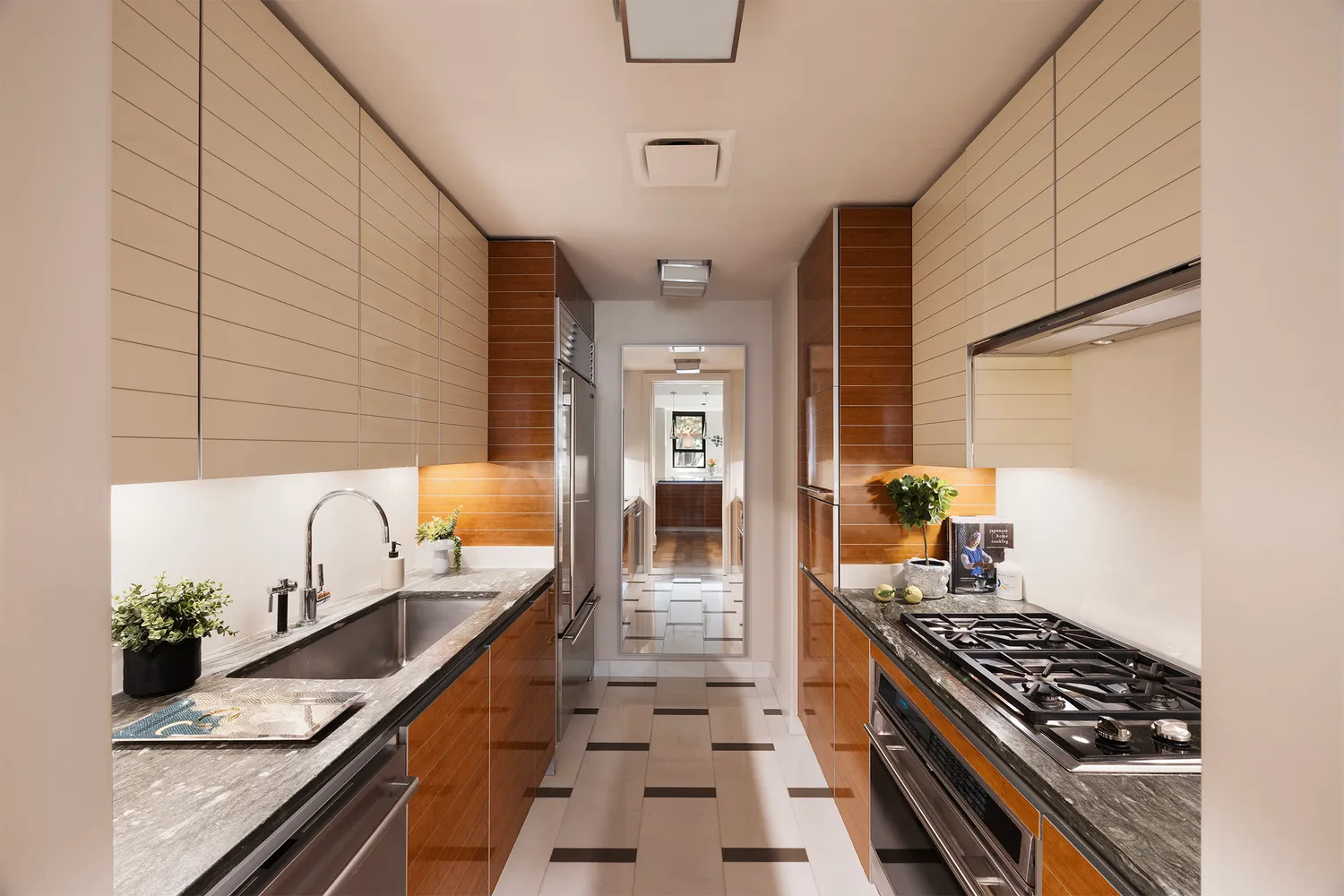 a kitchen with granite countertop stainless steel appliances and counter space