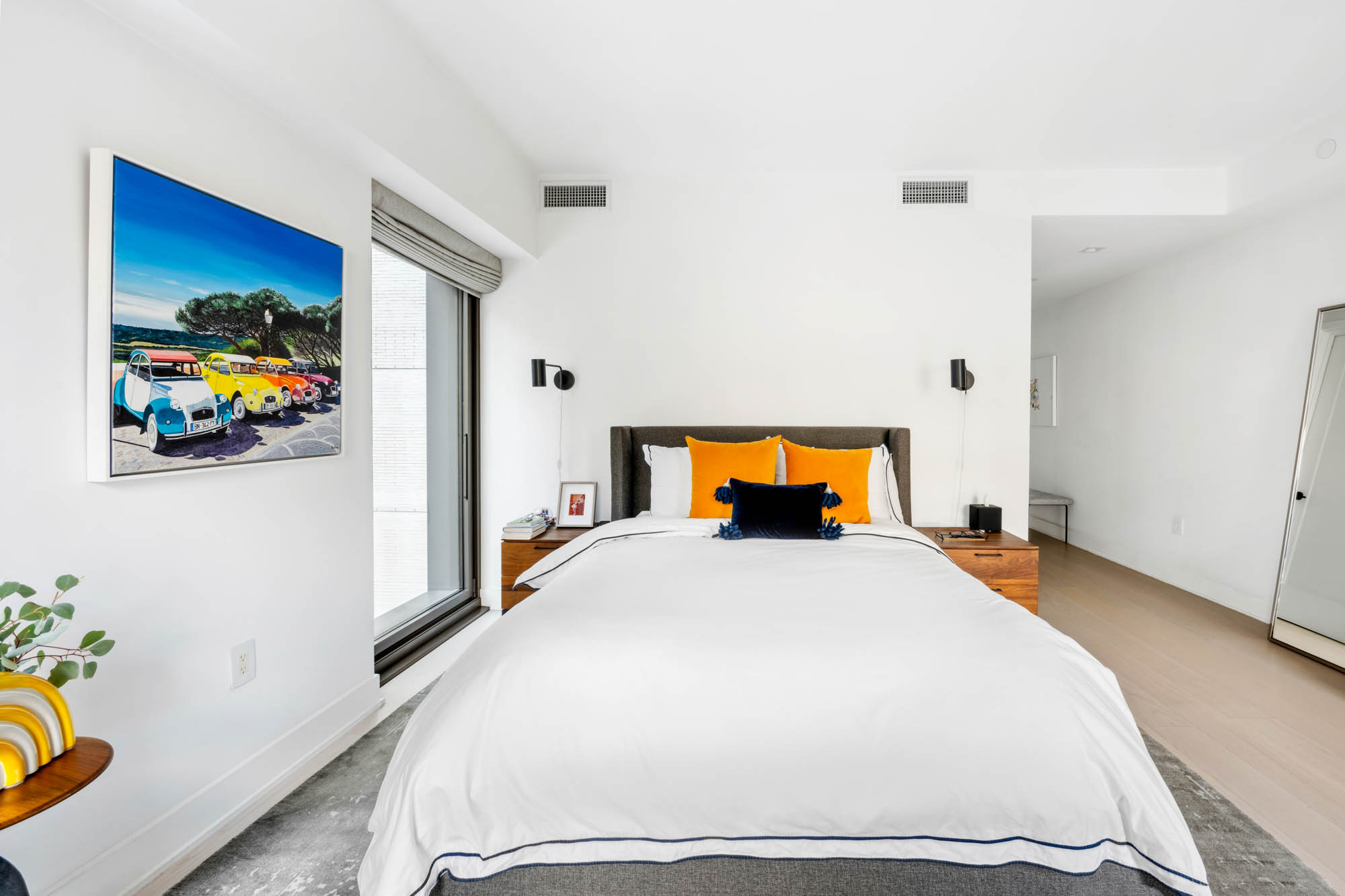 55 West 17th Street, Unit 701 Manhattan, NY 10011 - Photo 5 of 20 a bedroom with bed and wooden floor