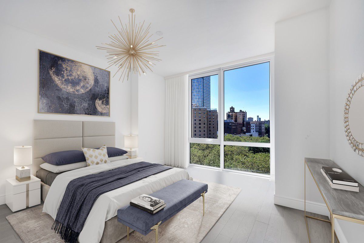 1399 Park Avenue, Unit 7B Manhattan, NY 10029 - Photo 5 of 14 a bedroom with a bed and a painting on the wall