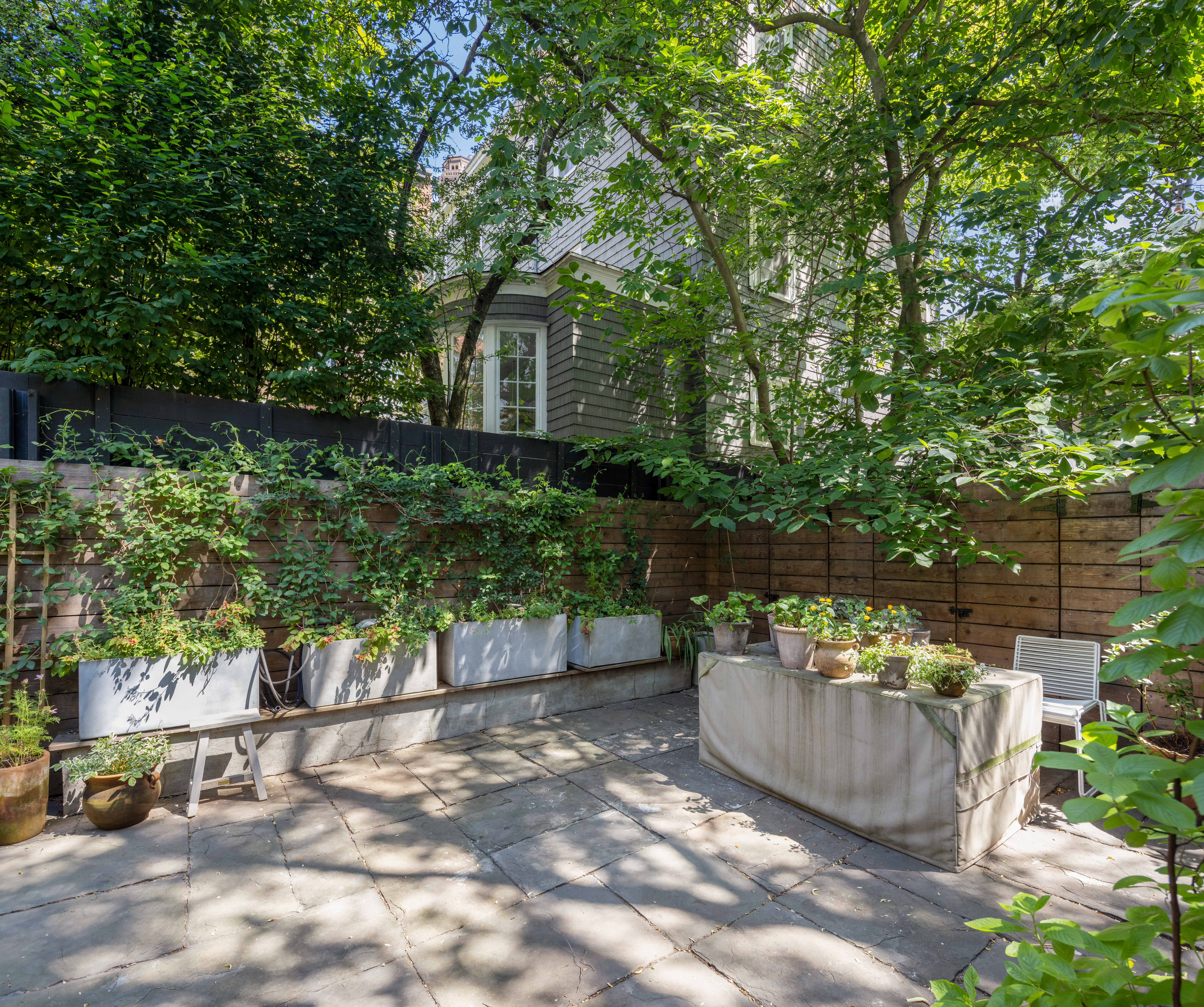 113 Columbia Heights, Unit PARLOR Brooklyn, NY 11201 - Photo 11 of 12 a view of a backyard with sitting area