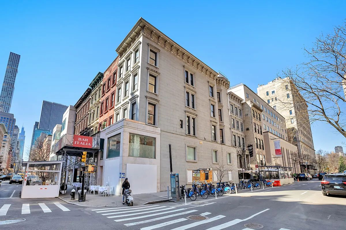 a view of a building and a street