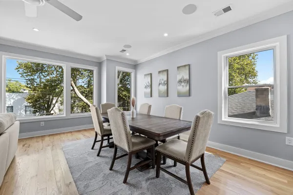a view of a dining room with furniture window and outside view