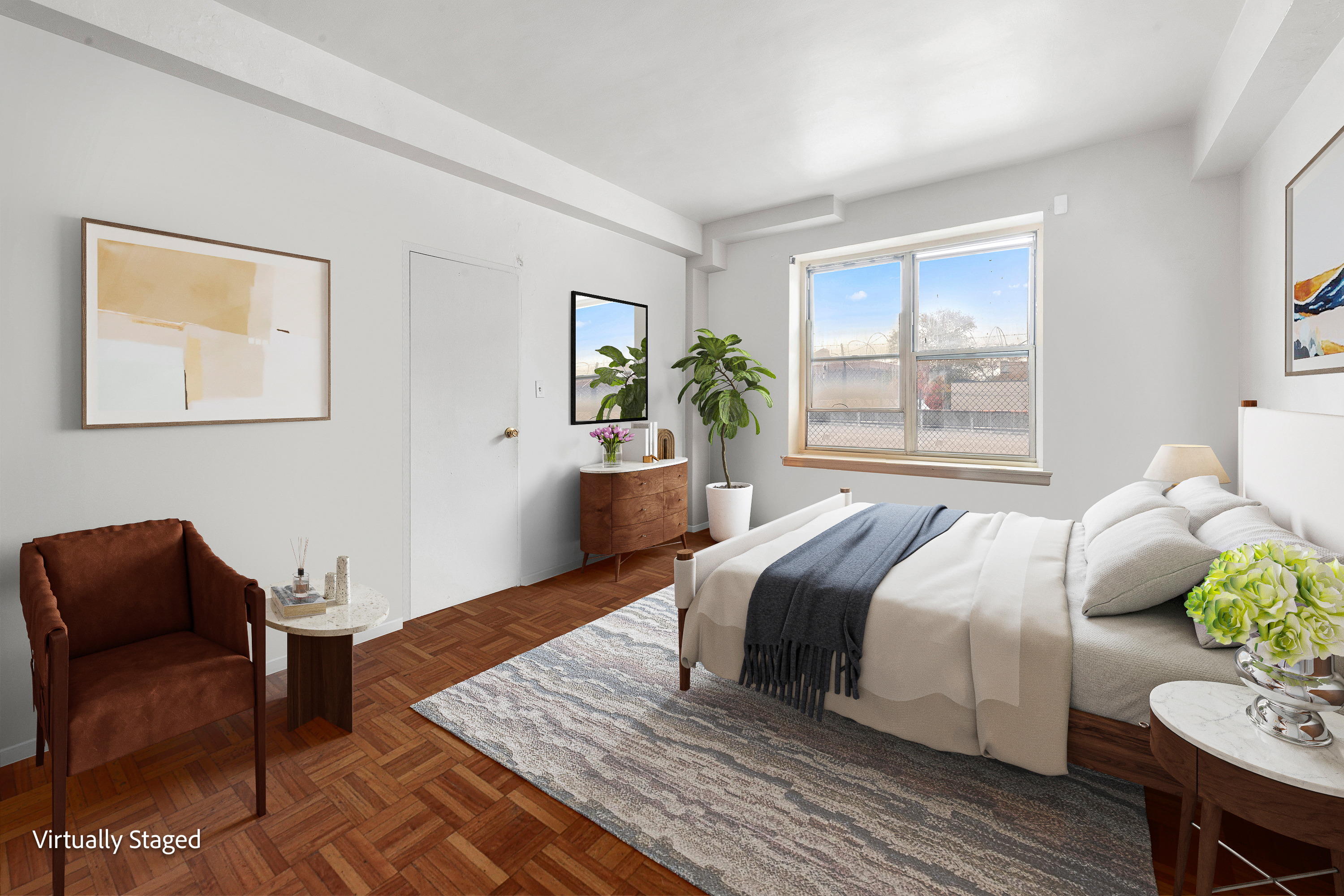 800 Grand Concourse, Unit GMS Bronx, NY 10451 - Photo 4 of 13 a bedroom with a bed and wooden floor