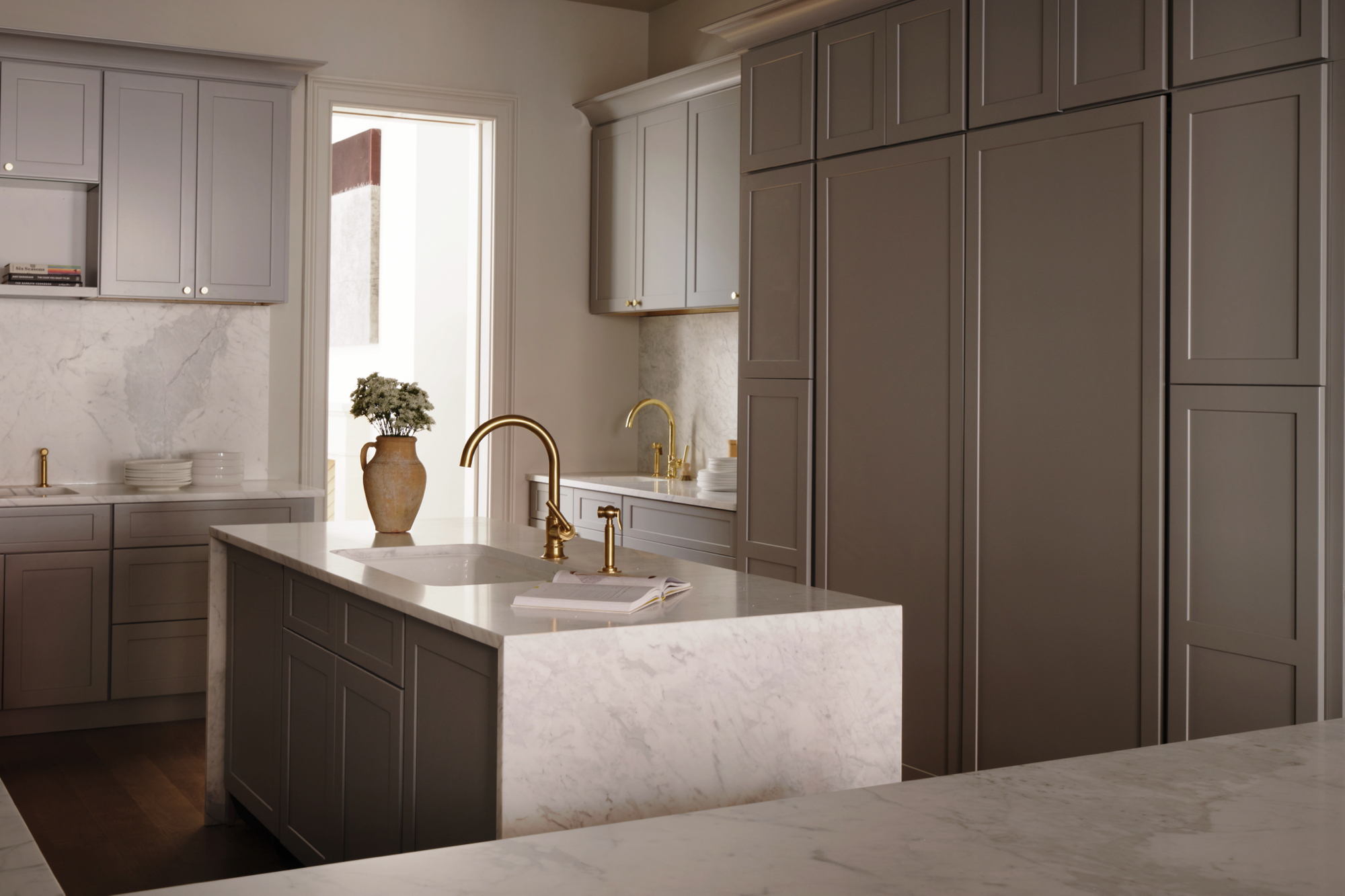 48-50 West 69th Street Manhattan, NY 10023 - Photo 12 of 33 a kitchen with a sink and a refrigerator