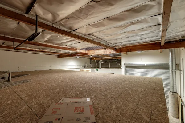 a front view of house with a garden