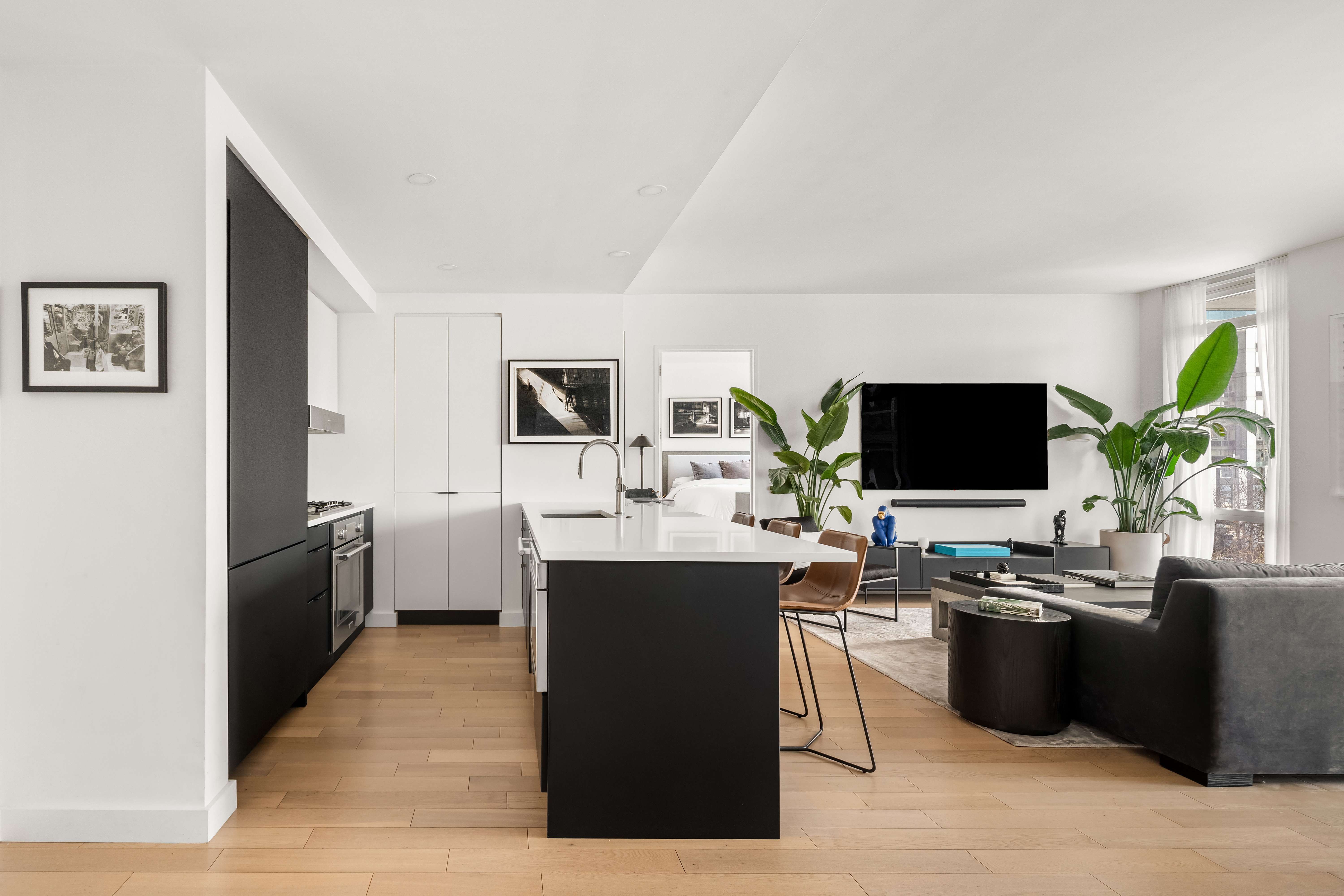 22 North 6th Street, Unit 4S Brooklyn, NY 11249 - Photo 1 of 12 a kitchen with a sink cabinets and stainless steel appliances