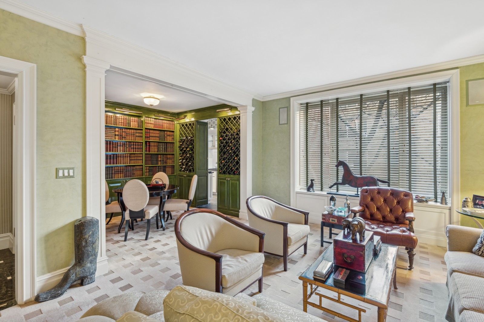 333 East 57th Street, Unit 4F Manhattan, NY 10022 - Photo 3 of 9 a living room with furniture and a large window