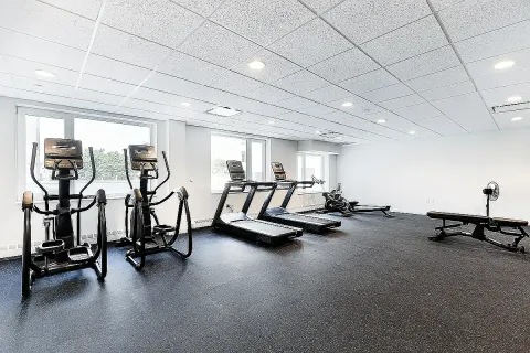 a view of a room with gym equipment