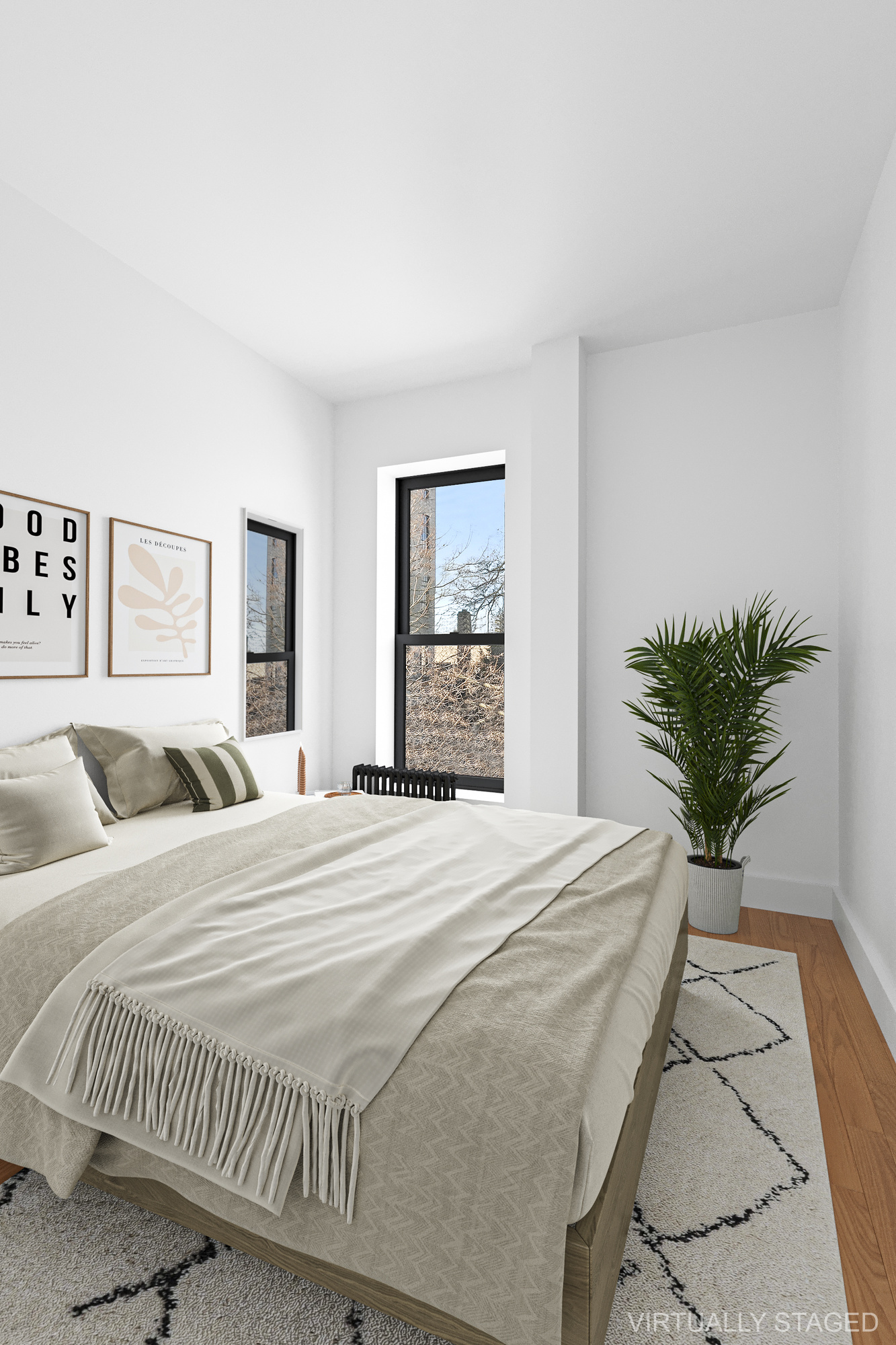 82 7th Avenue, Unit 4 Brooklyn, NY 11217 - Photo 9 of 10 a bedroom with a large bed and a potted plant