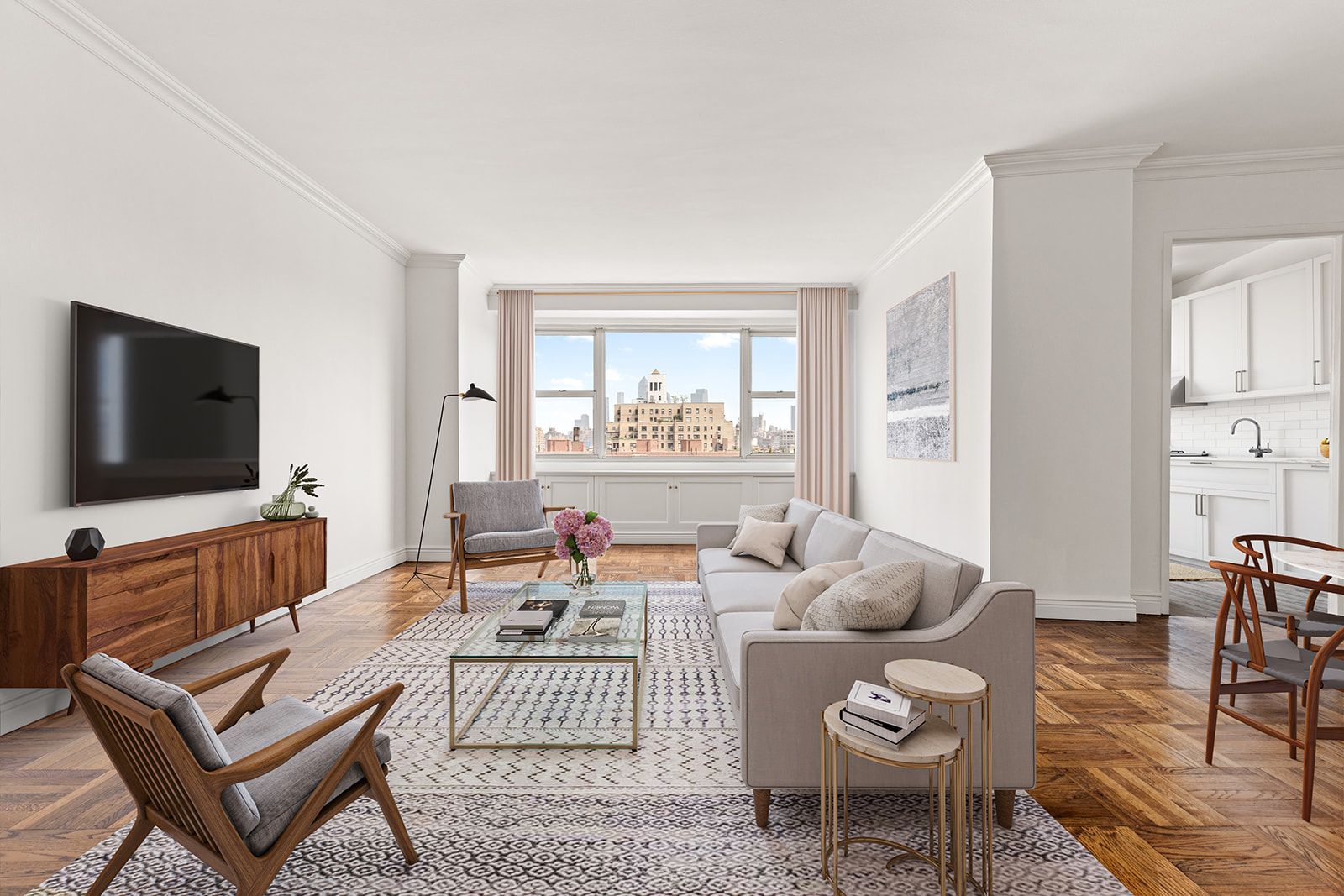 2 Charlton Street, Unit 9E Manhattan, NY 10014 - Photo 3 of 16 a living room with furniture and a flat screen tv