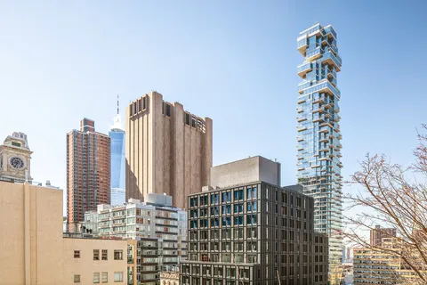 a view of a city with tall buildings
