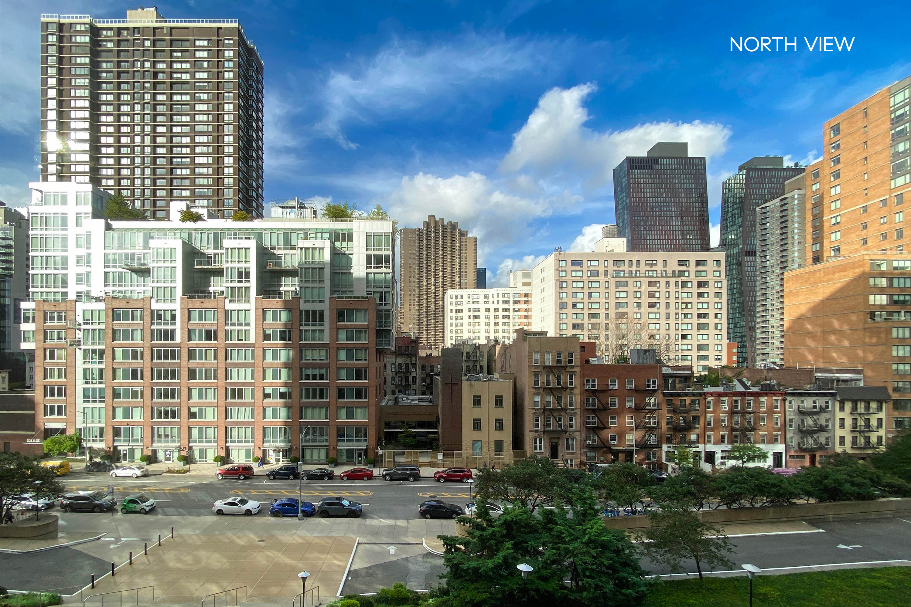 330 East 33rd Street, Unit 3F Manhattan, NY 10016 - Photo 2 of 15 a view of a building with a street