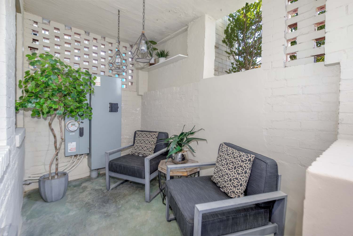 3123 Warder Street Northwest, Unit 1 Washington, DC 20010 - Photo 4 of 24 a living room with furniture and a chandelier
