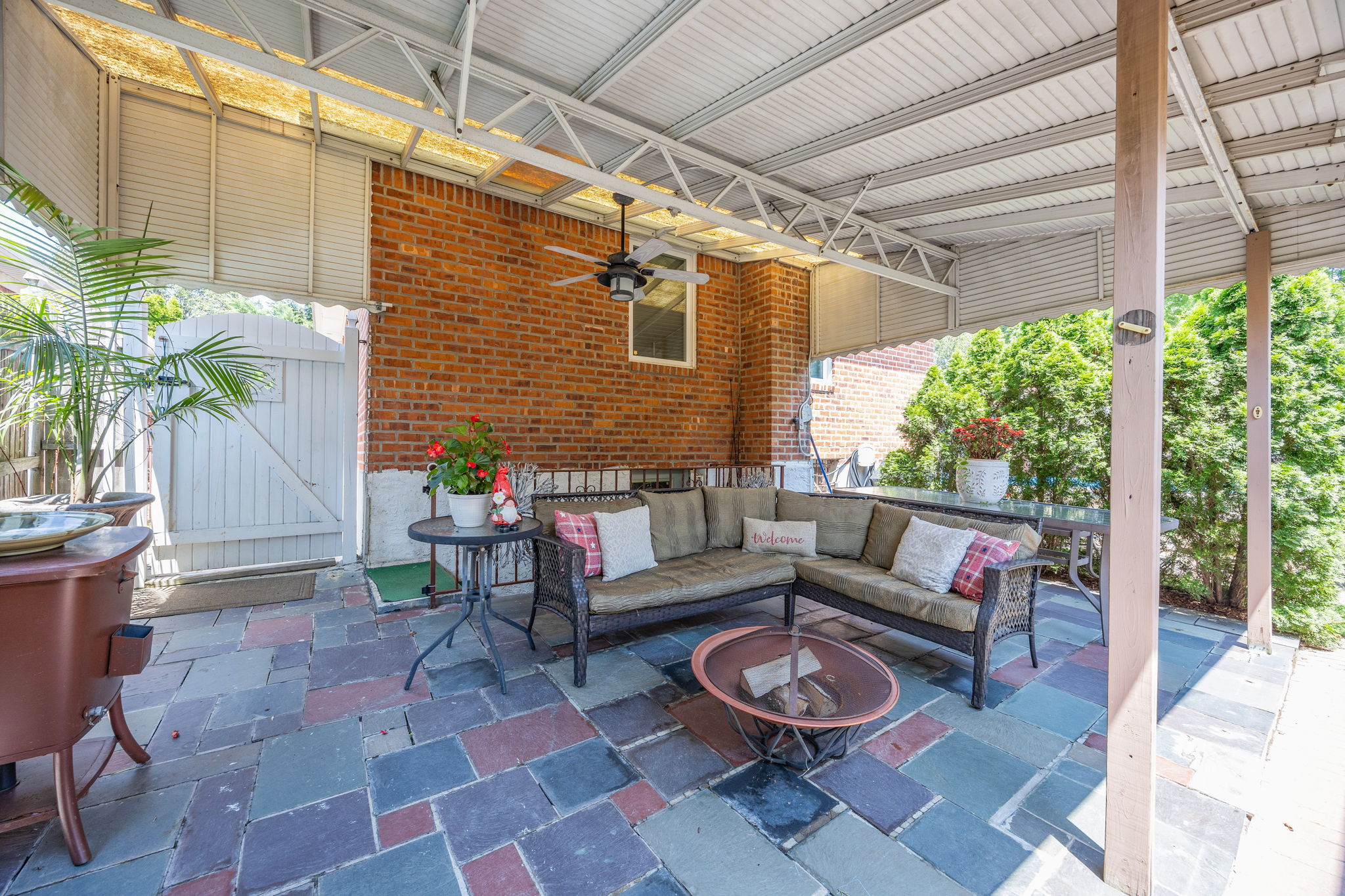 141-18 14th Avenue Queens, NY 11357 - Photo 15 of 26 a outdoor living space with furniture and a potted plant