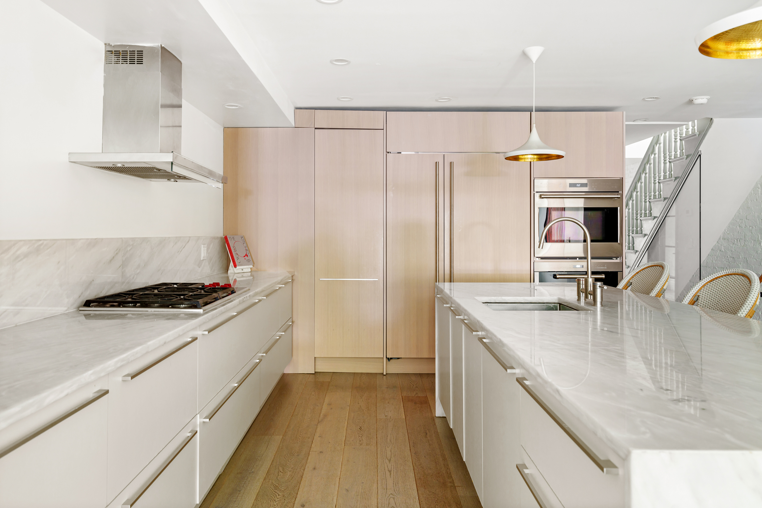265 6th Avenue Brooklyn, NY 11215 - Photo 6 of 24 a kitchen with stainless steel appliances granite countertop a sink stove and refrigerator