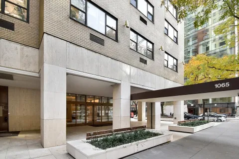 a view of a building with sitting area