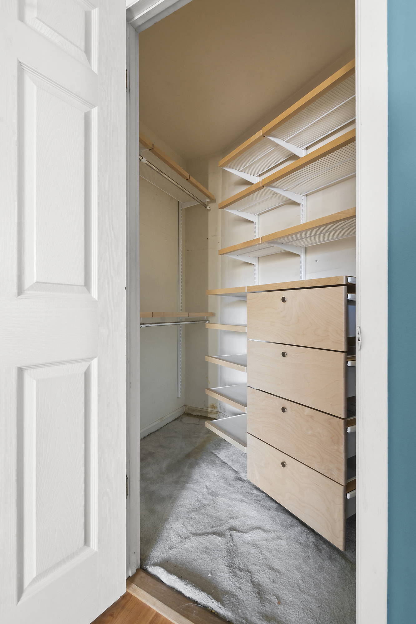 21-08 Butler Avenue, Unit J2 Queens, NY 11385 - Photo 6 of 14 a view of an empty walk in closet