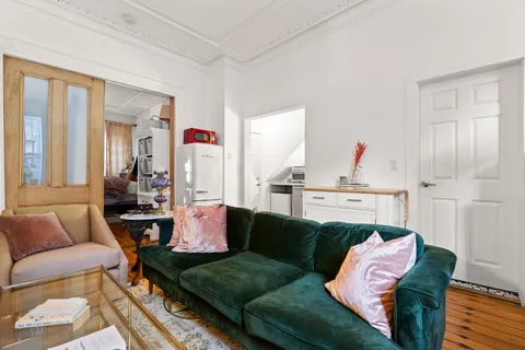 a living room with furniture and a couch