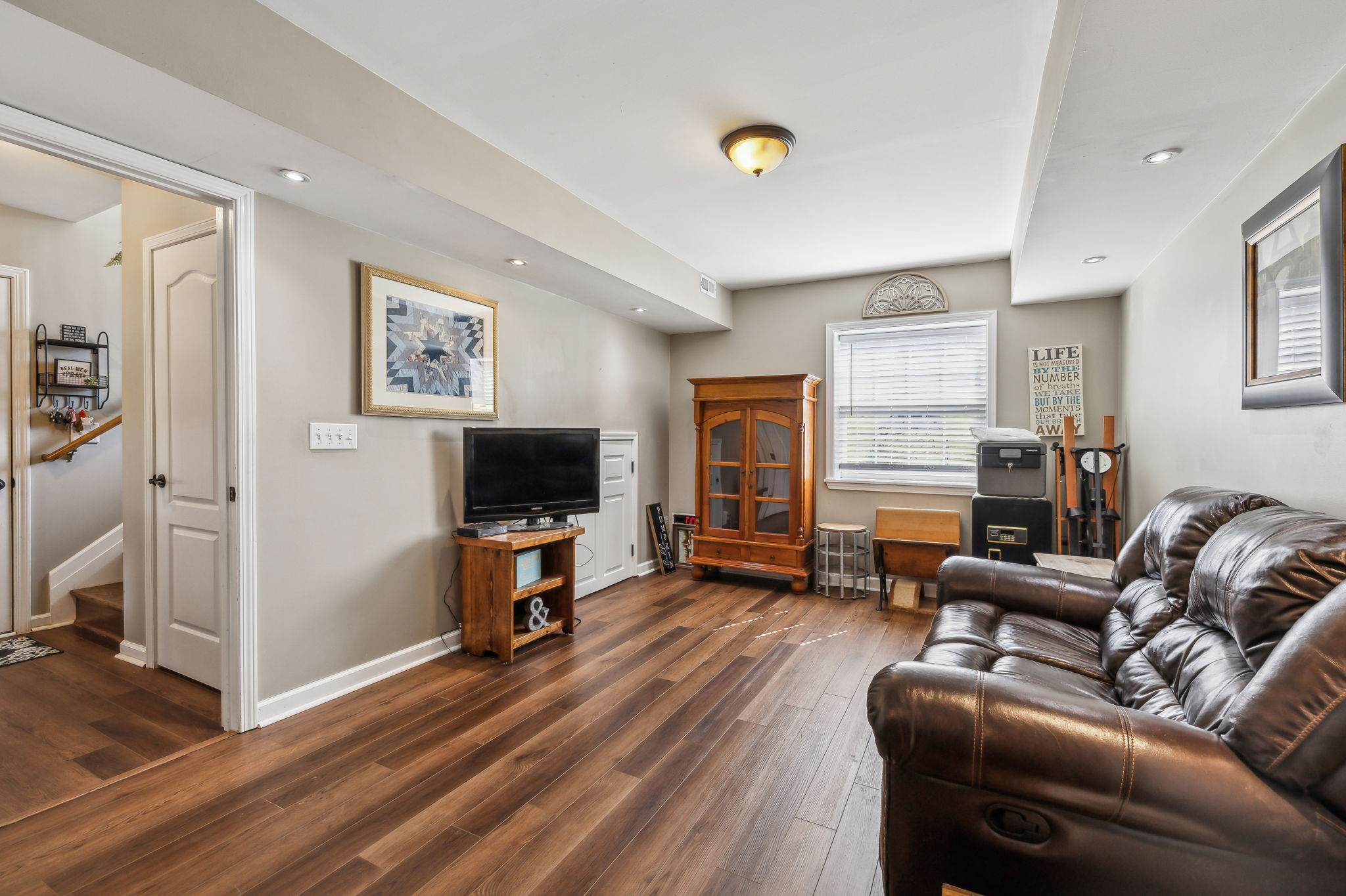 405 Billy Lane Spring Hill, TN 37174 - Photo 25 of 39 a living room with furniture and a flat screen tv