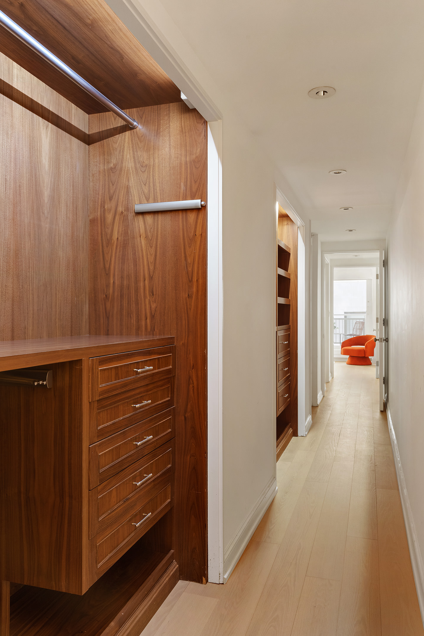 16 Warren Street, Unit 5 Manhattan, NY 10007 - Photo 11 of 18 a view of a hallway with closet and cabinet