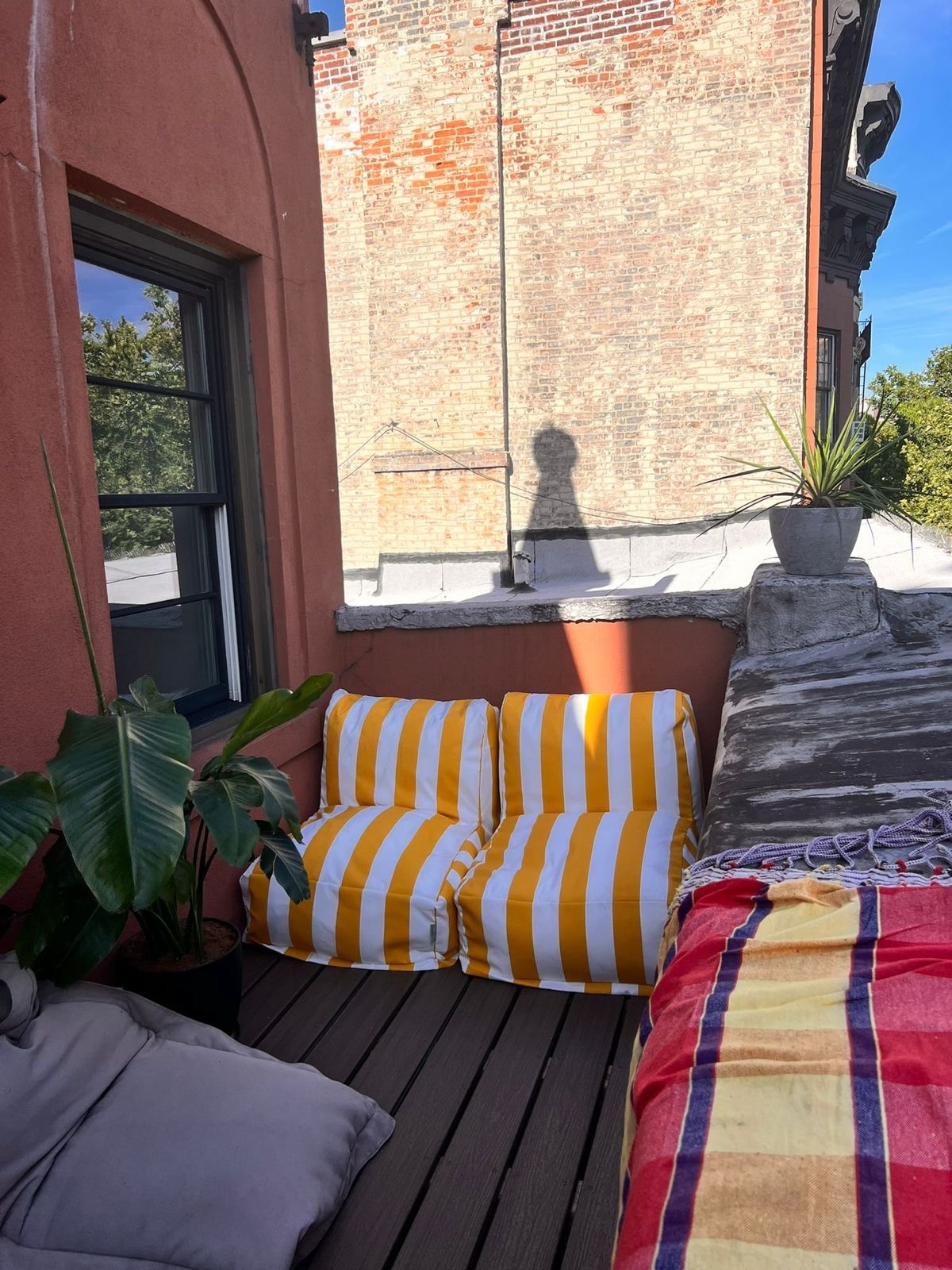 73 Perry Street, Unit 5 Manhattan, NY 10014 - Photo 2 of 10 a bed sitting in a bedroom next to a window