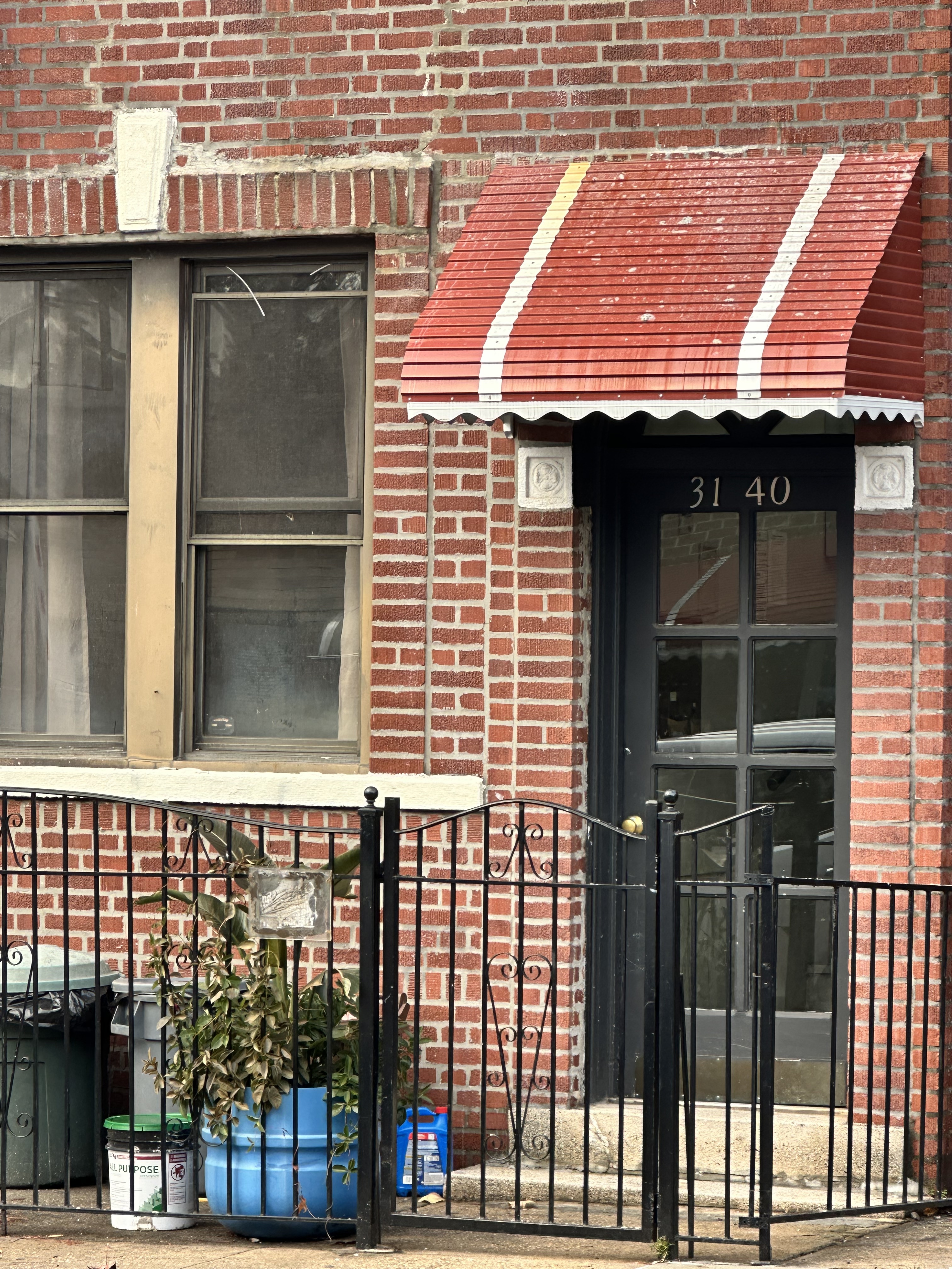 31-40 42nd Street, Unit 1F Queens, NY 11103 - Photo 9 of 9 a front view of a house with glass windows