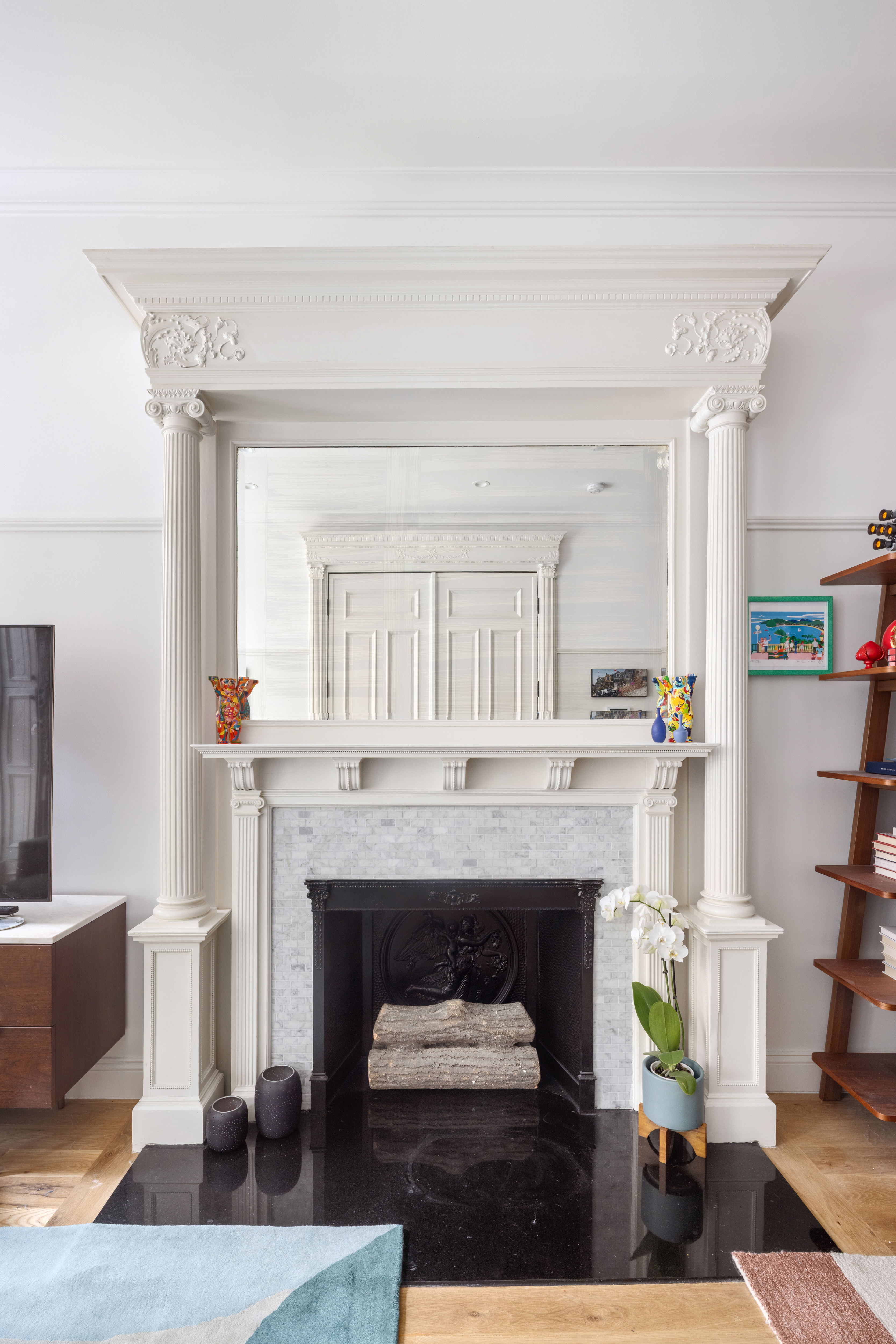 75 8th Avenue, Unit 2 Brooklyn, NY 11215 - Photo 2 of 16 a living room with furniture and a fireplace