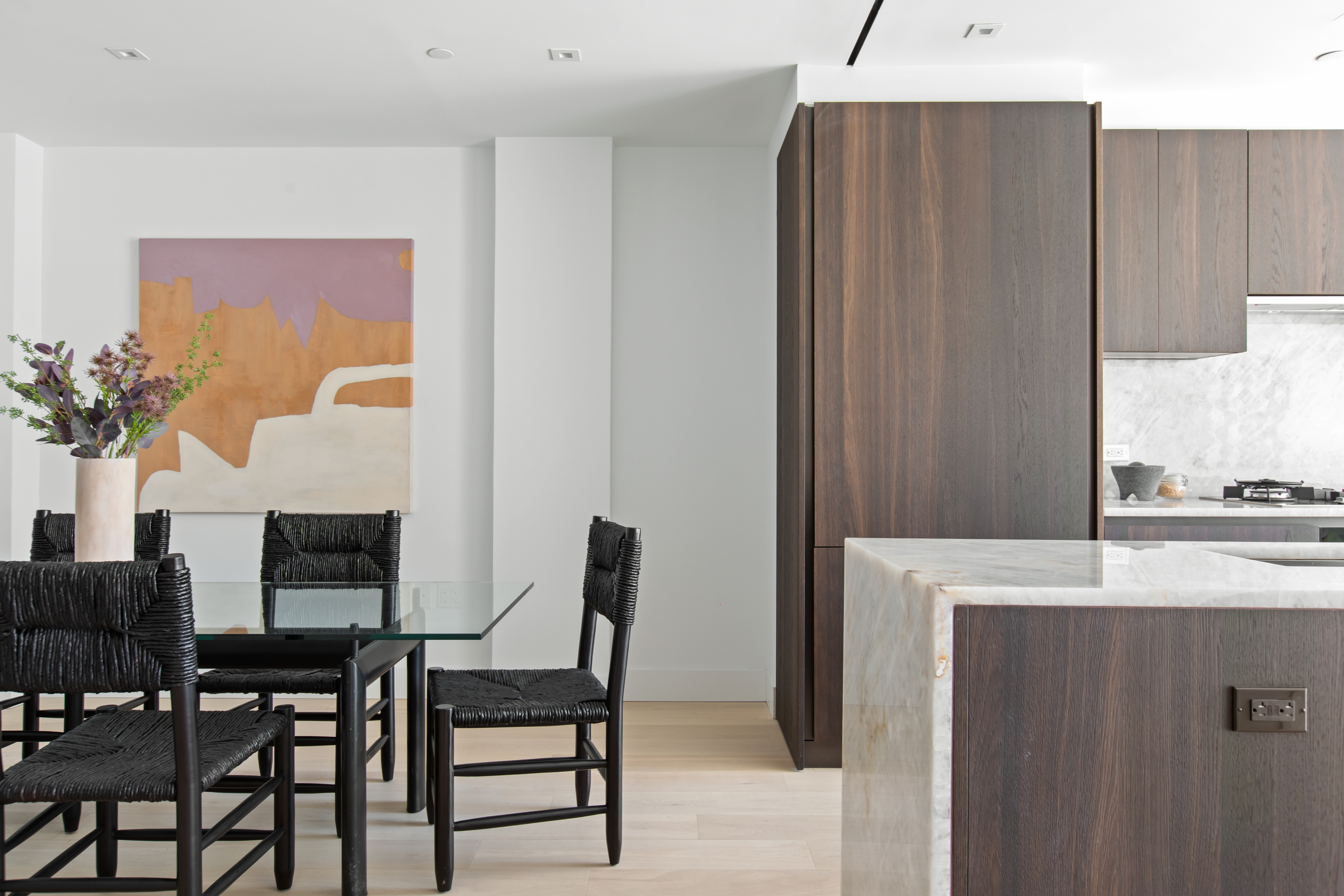165 Chrystie Street, Unit 3 Manhattan, NY 10002 - Photo 5 of 13 a view of a dining room with furniture and wooden floor