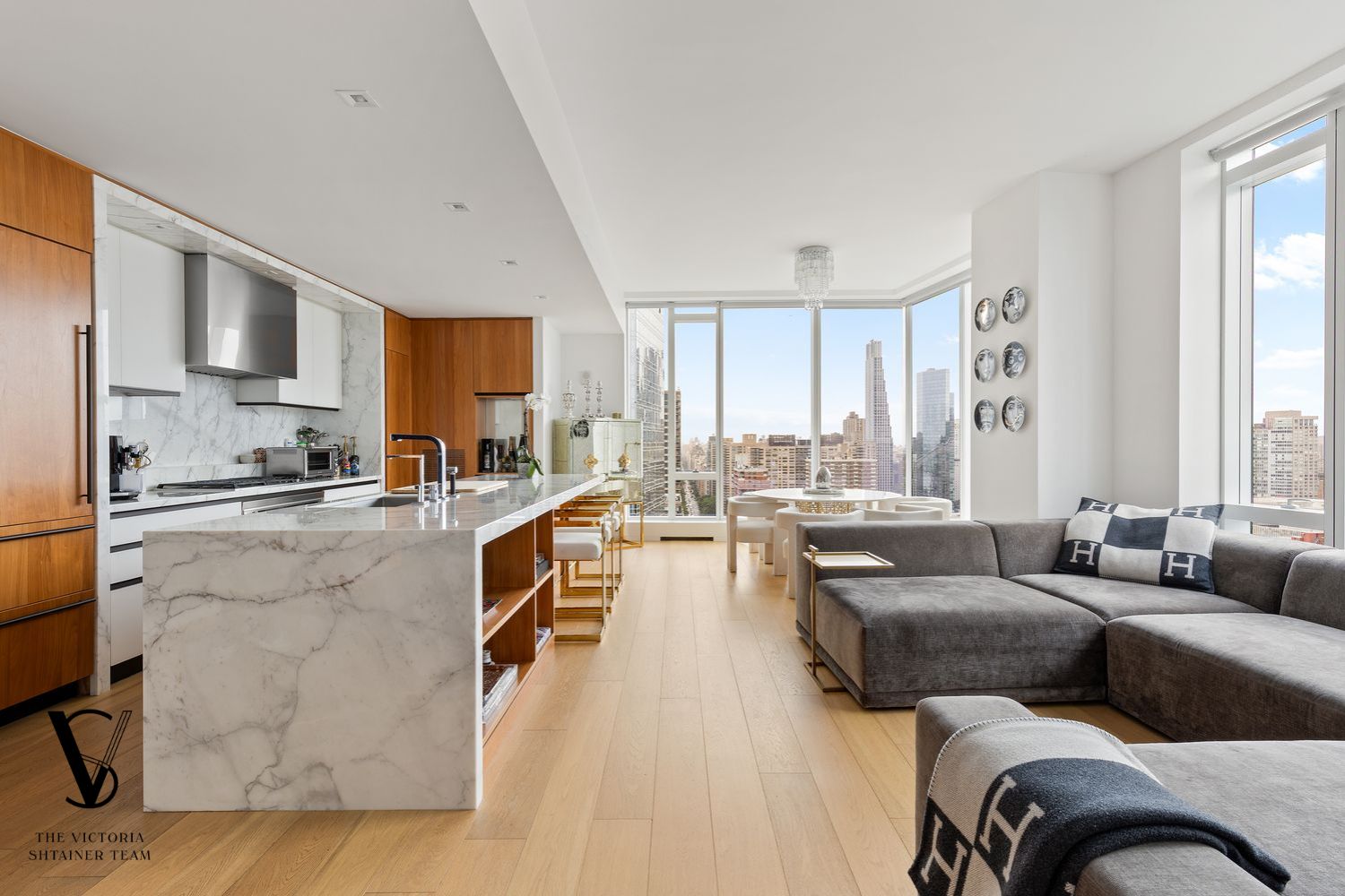 1 West End Avenue, Unit C28 Manhattan, NY 10069 - Photo 1 of 26 a living room with furniture and a large window