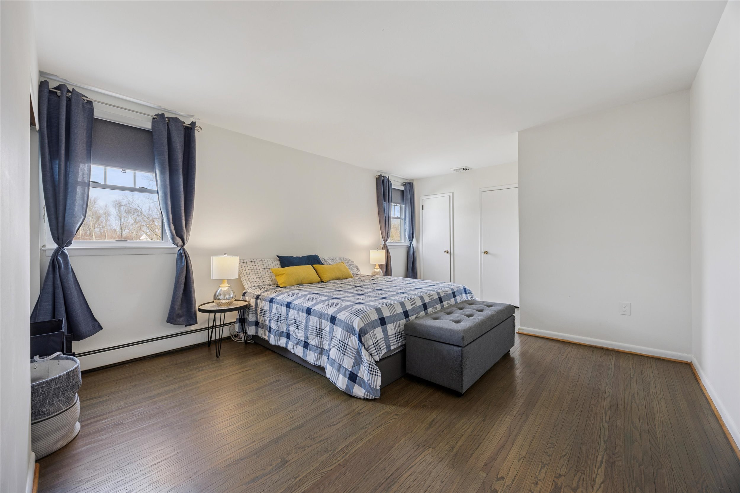 535 Bell Lane Ambler, PA 19002 - Photo 19 of 45 a bedroom with a bed and a mirror