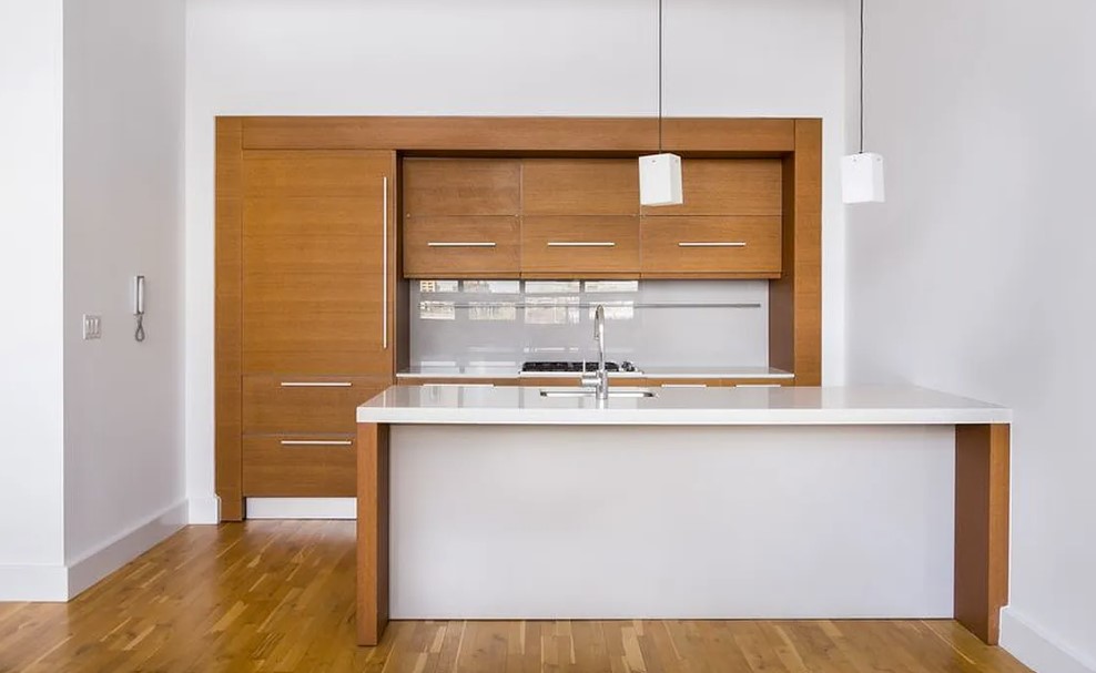 360 Furman Street, Unit 221 Brooklyn, NY 11201 - Photo 3 of 36 a kitchen with a sink a window and cabinets